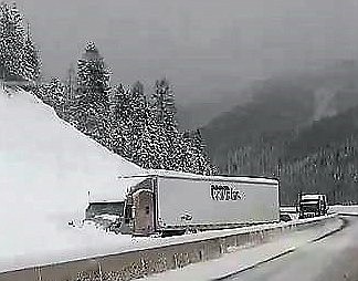 Two avalanches on Interstate 90 stopped westbound traffic from Wednesday afternoon until Thursday evening Feb. 13 and 14. A semi-truck was partially buried one mile east of the Montana/Idaho border. (Photos courtesy of Trebb Rainey)