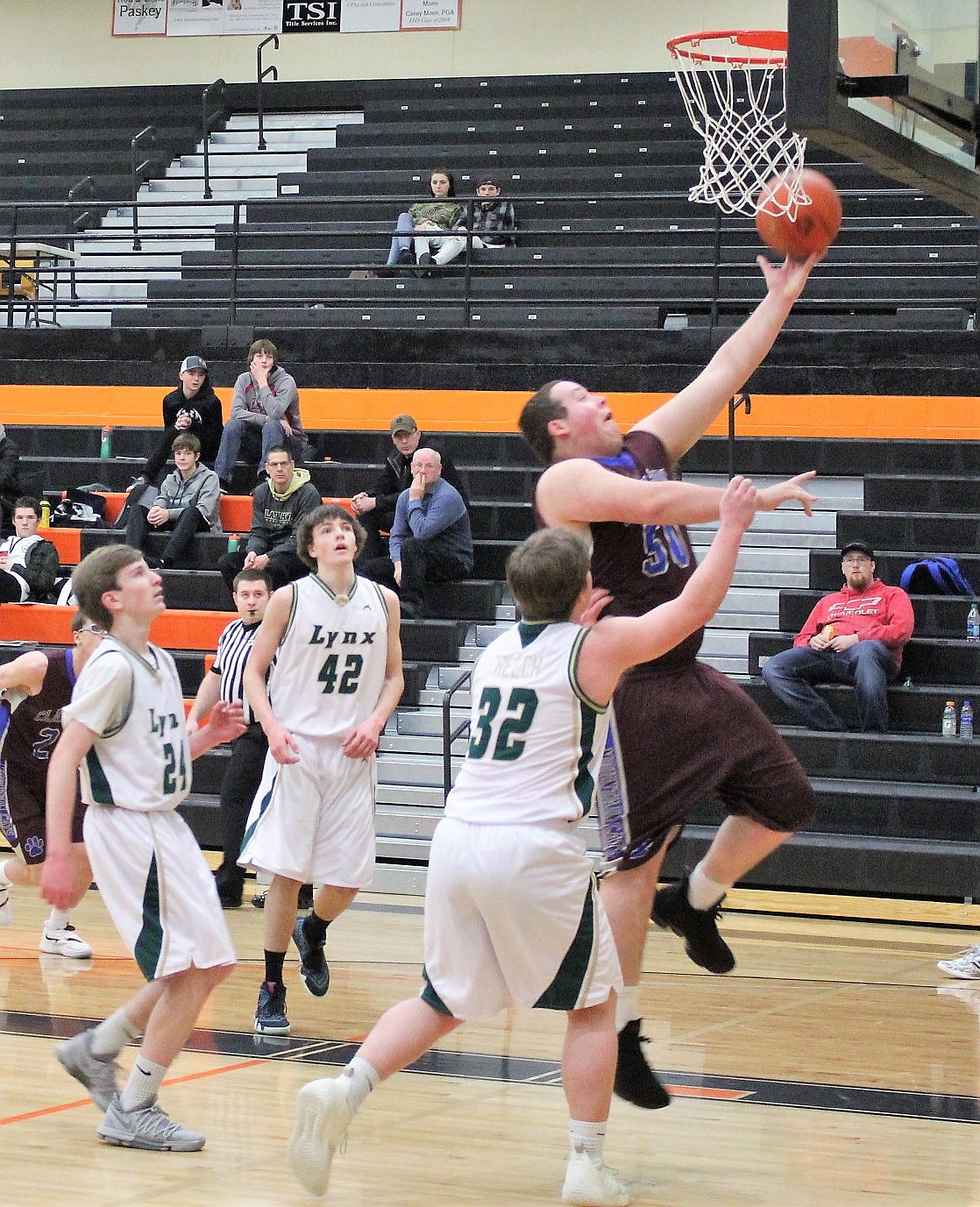 CLARK FORK Mountain Cat Michael Spence gets a layup against Lincoln at 13C District Tournament in Frenchtown. The Cats were to play a challenge game against Darby on Monday evening for second place and a divisional tournament berth. (Kathleen Woodford/Mineral Independent)