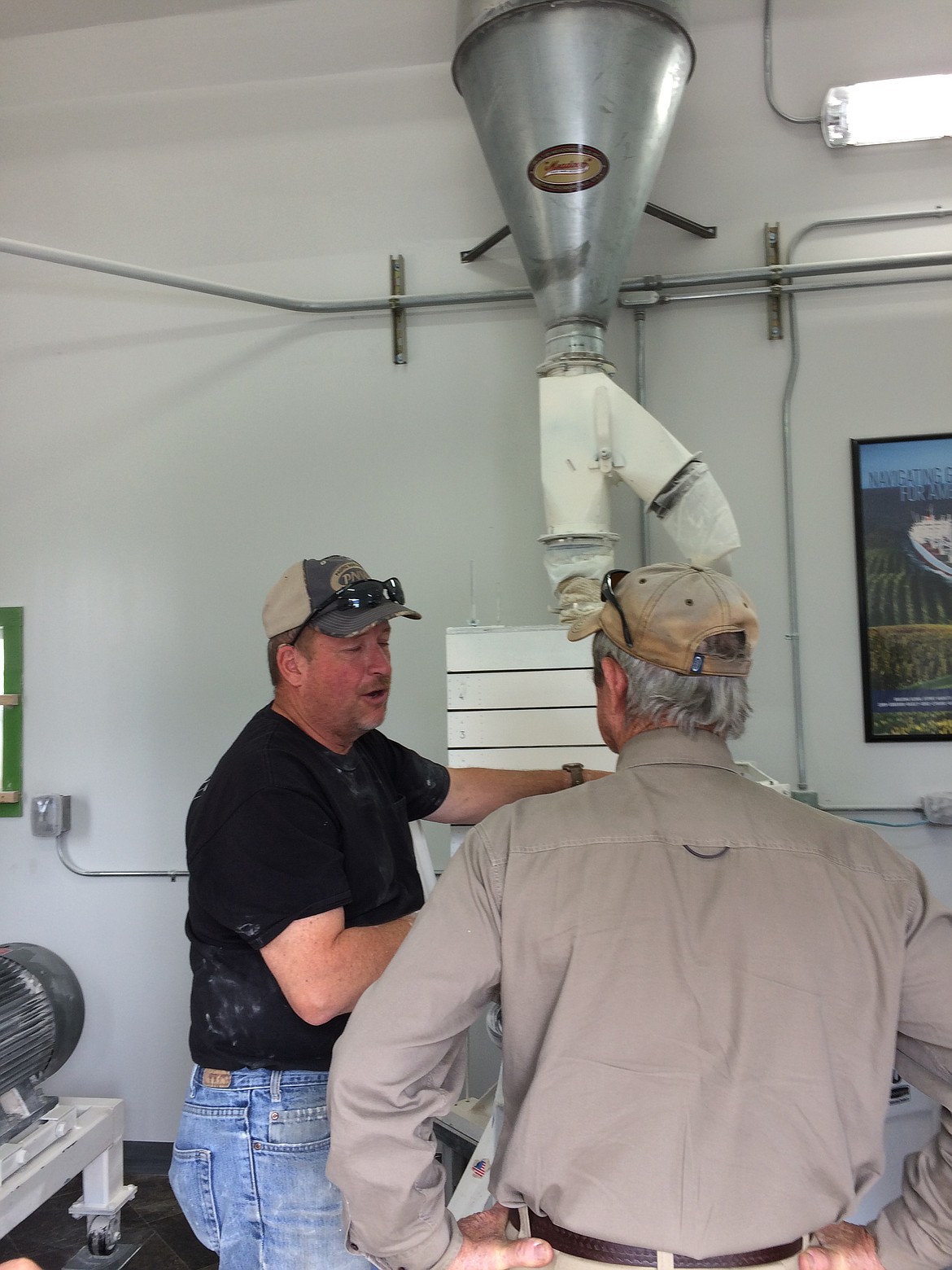 Tim Dillin running the flour mill.