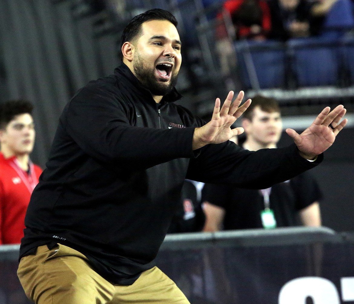 Connor Vanderweyst/Sun TribuneOthello coach Rudy Ochoa II coaching at the Tacoma Dome.