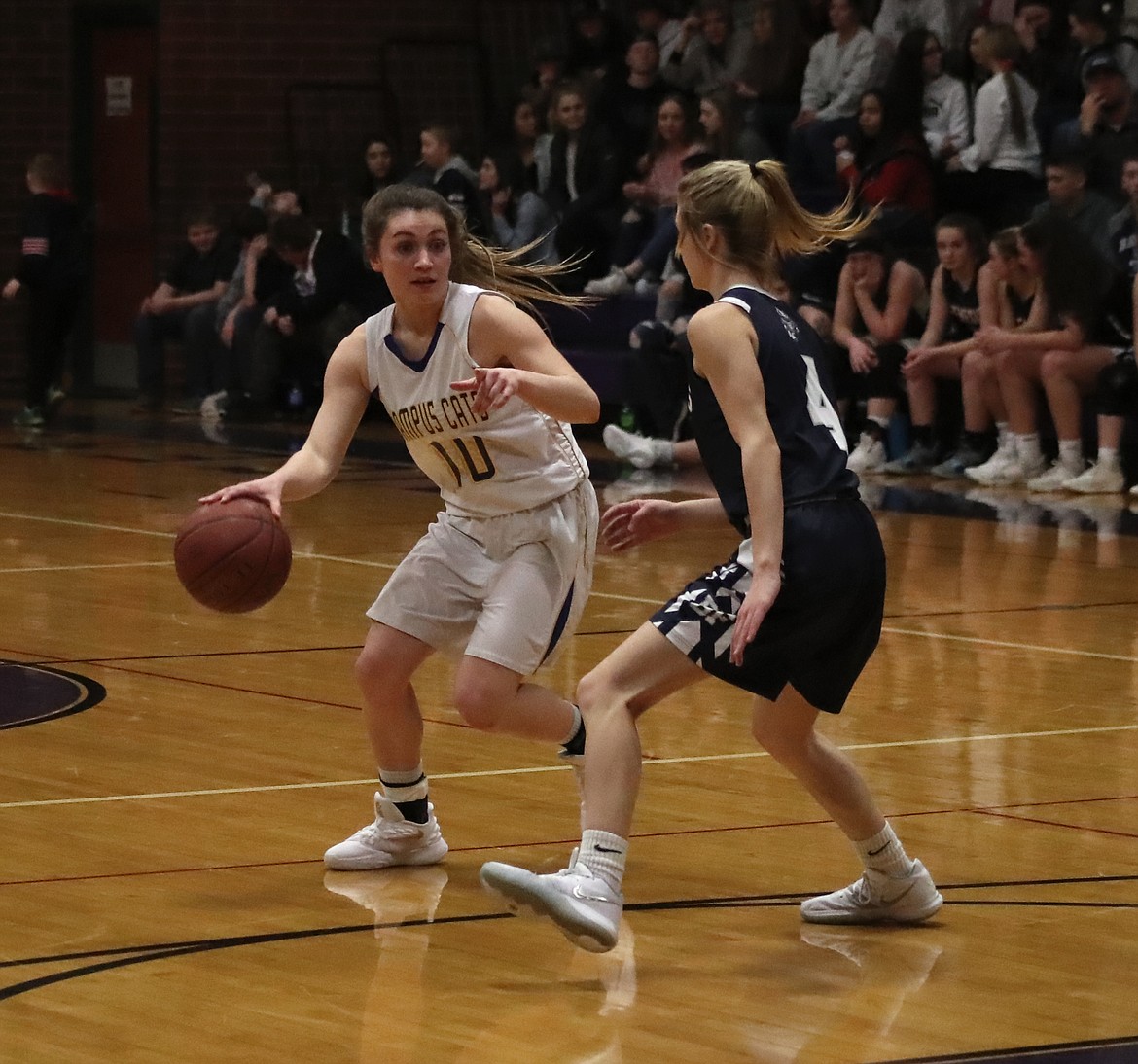 (Photo by KYLE CAJERO)
Brooke Stevens dribbles past Bonners Ferry senior Maecie Liermann in the District 1 All-Star game.