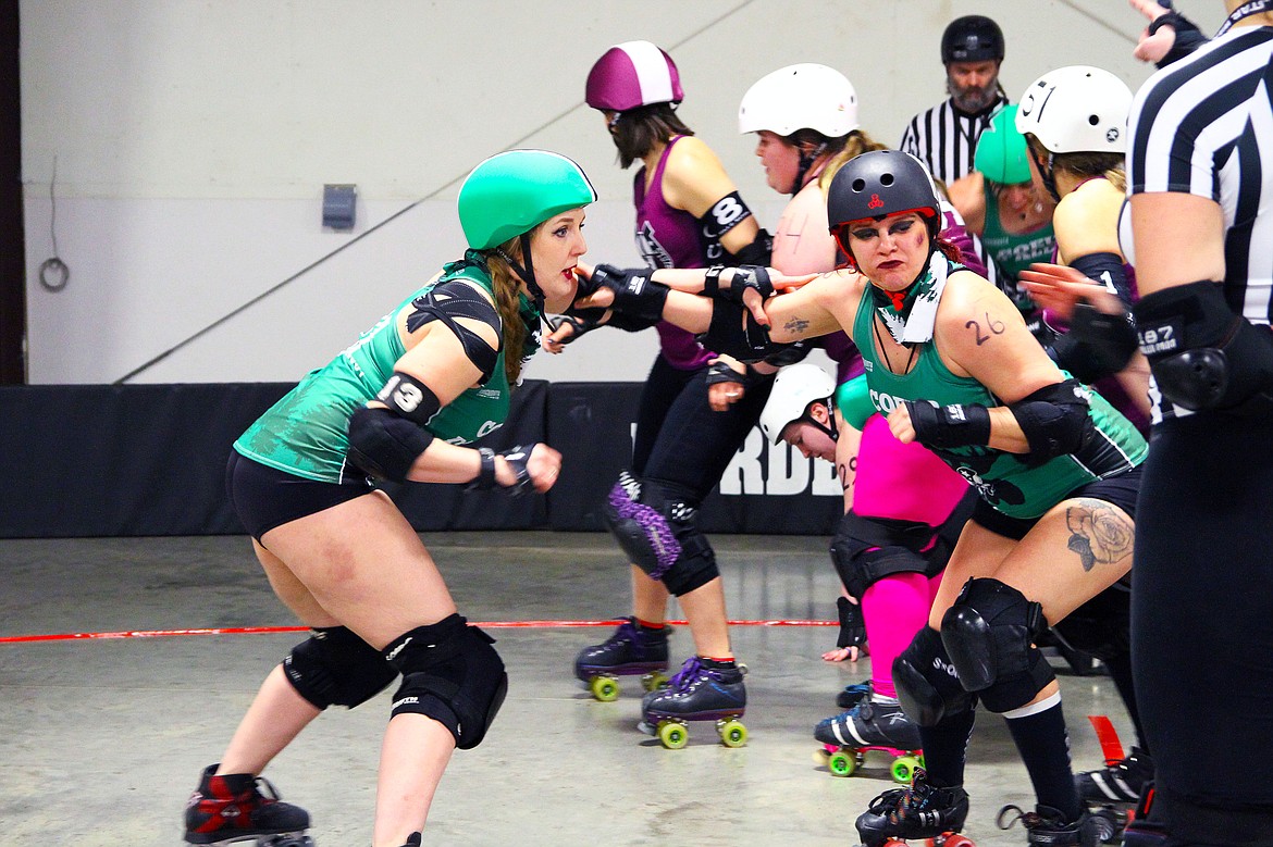 Rodeo City jammer, Hailey &#147;What the Hell Vetica&#148; McGraw at right, tries to break through defenders Sage &#147;Ziggy Stardust&#148; Jensen, Amber &#147;Rosie the Revolter&#148; Fuson and Lauren &#147;Wrectus Femoris&#148; Wimmer. (ANDREAS BRAUNLICH/Coeur Voice)