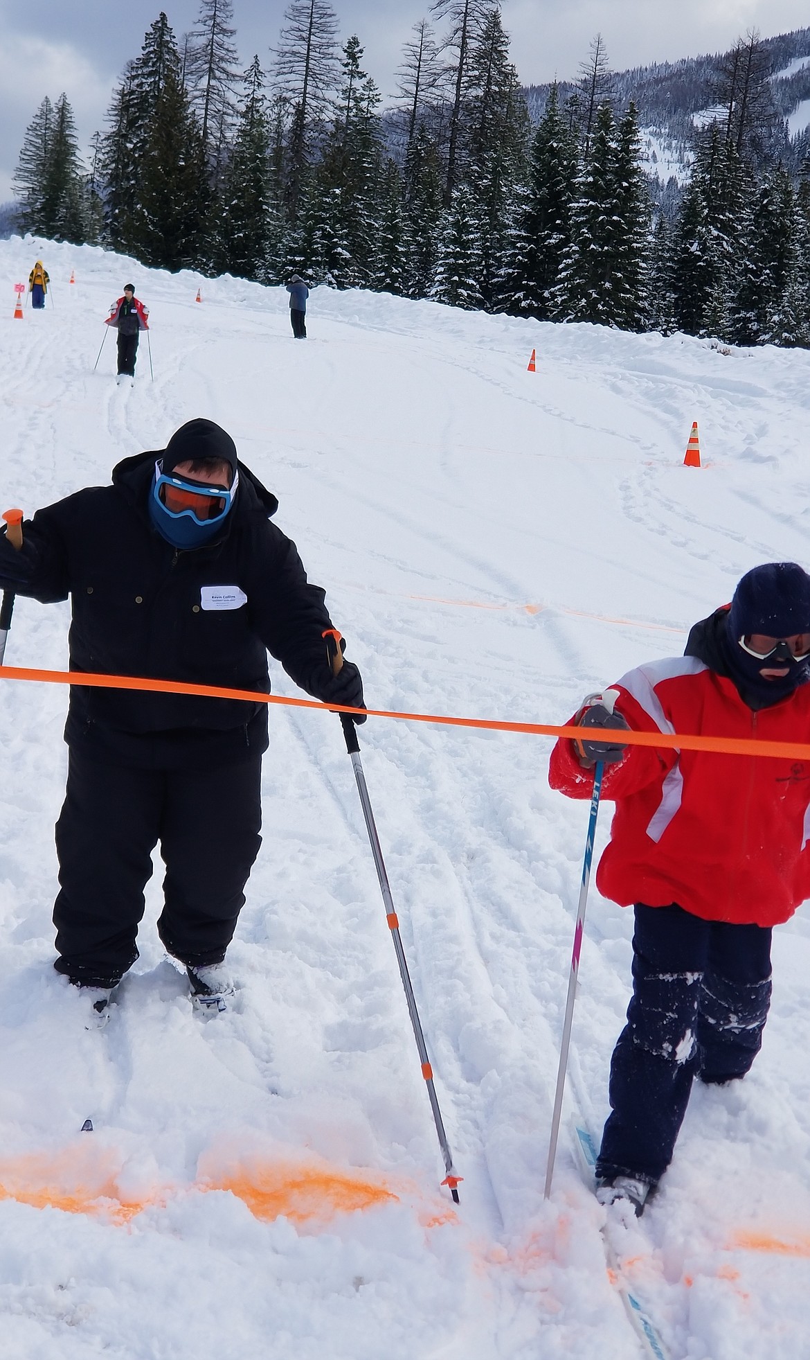 (Photo courtesy of CHRIS PAINTER)
Brothers Kevin Collins (right) and Eli Jennings (left) finish neck-and-neck during one of their Nordic ski races at the Northern State Games on Feb. 23.