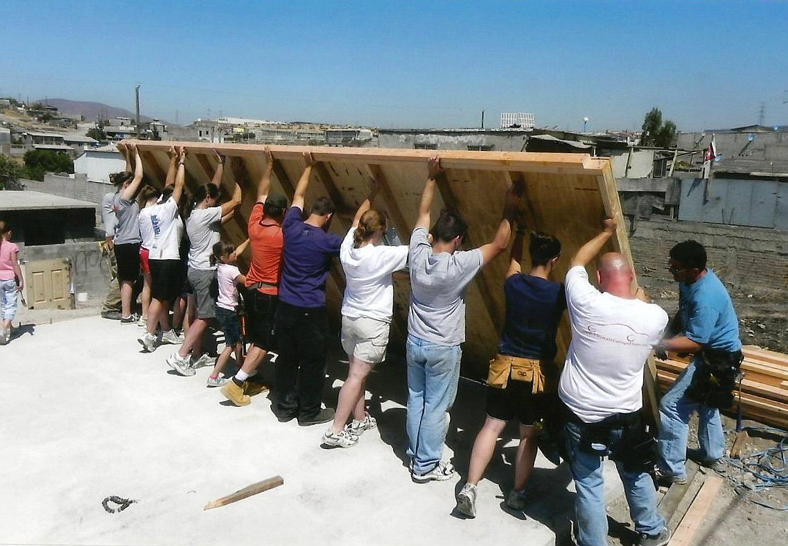 Courtesy photo
Volunteers raise a wall for a new home in El Florido, Mexico.