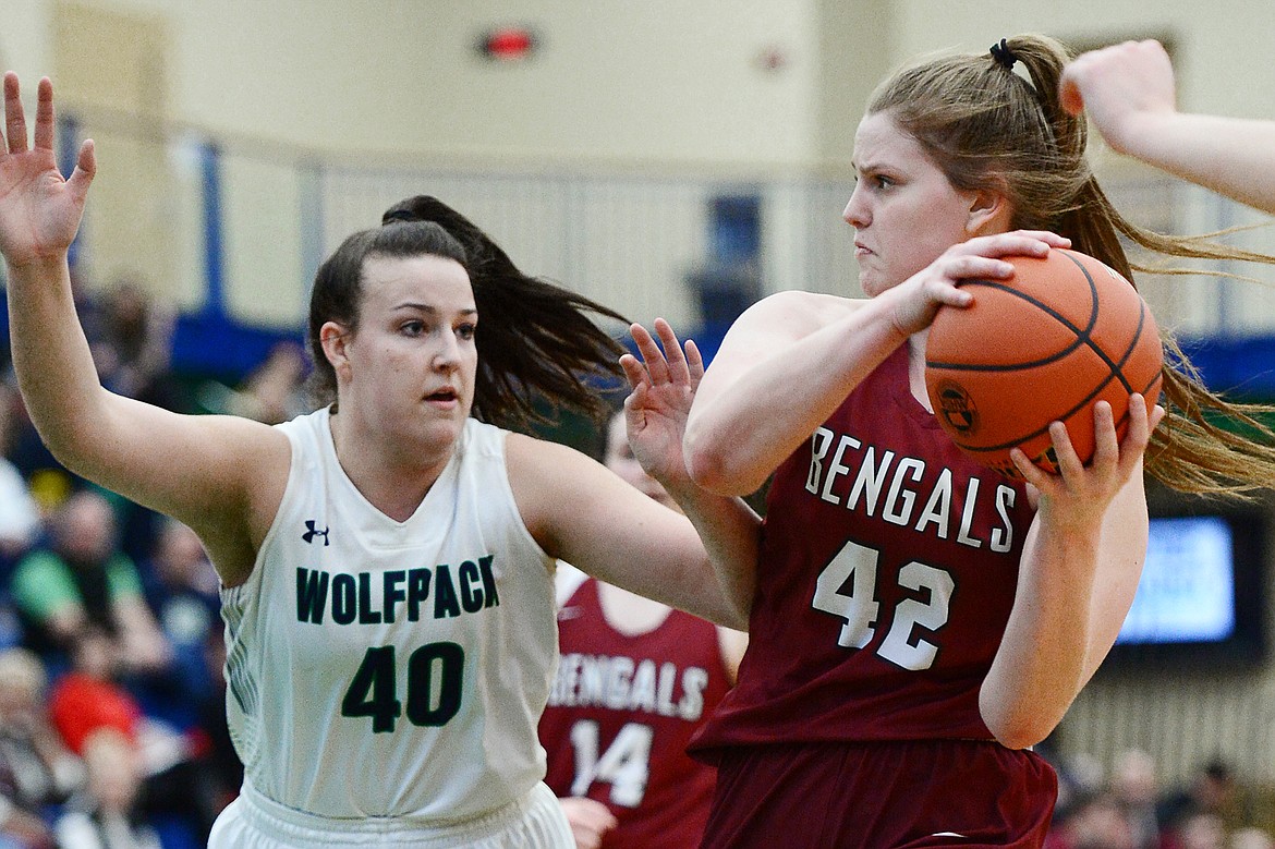 Helena High's Jamie Pickens (42) looks to pass with Glacier's Raley Shirey (40) defending during Western AA Divisional play at Glacier High School on Saturday. (Casey Kreider/Daily Inter Lake)