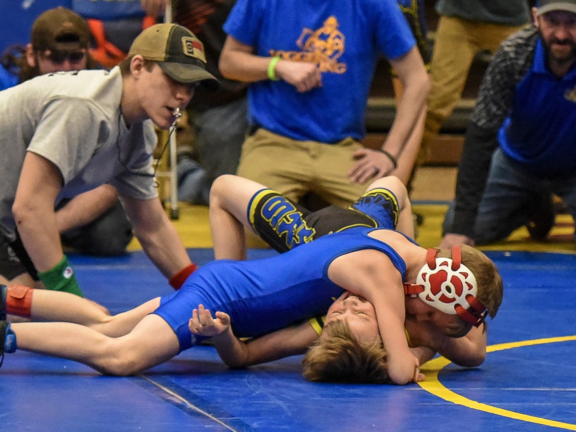 Collin Caley of Libby wrestles Trever Peterson of Thompson Falls at the Kootenai Klassic Wrestling Tournament Saturday. (Ben Kibbey/The Western News)