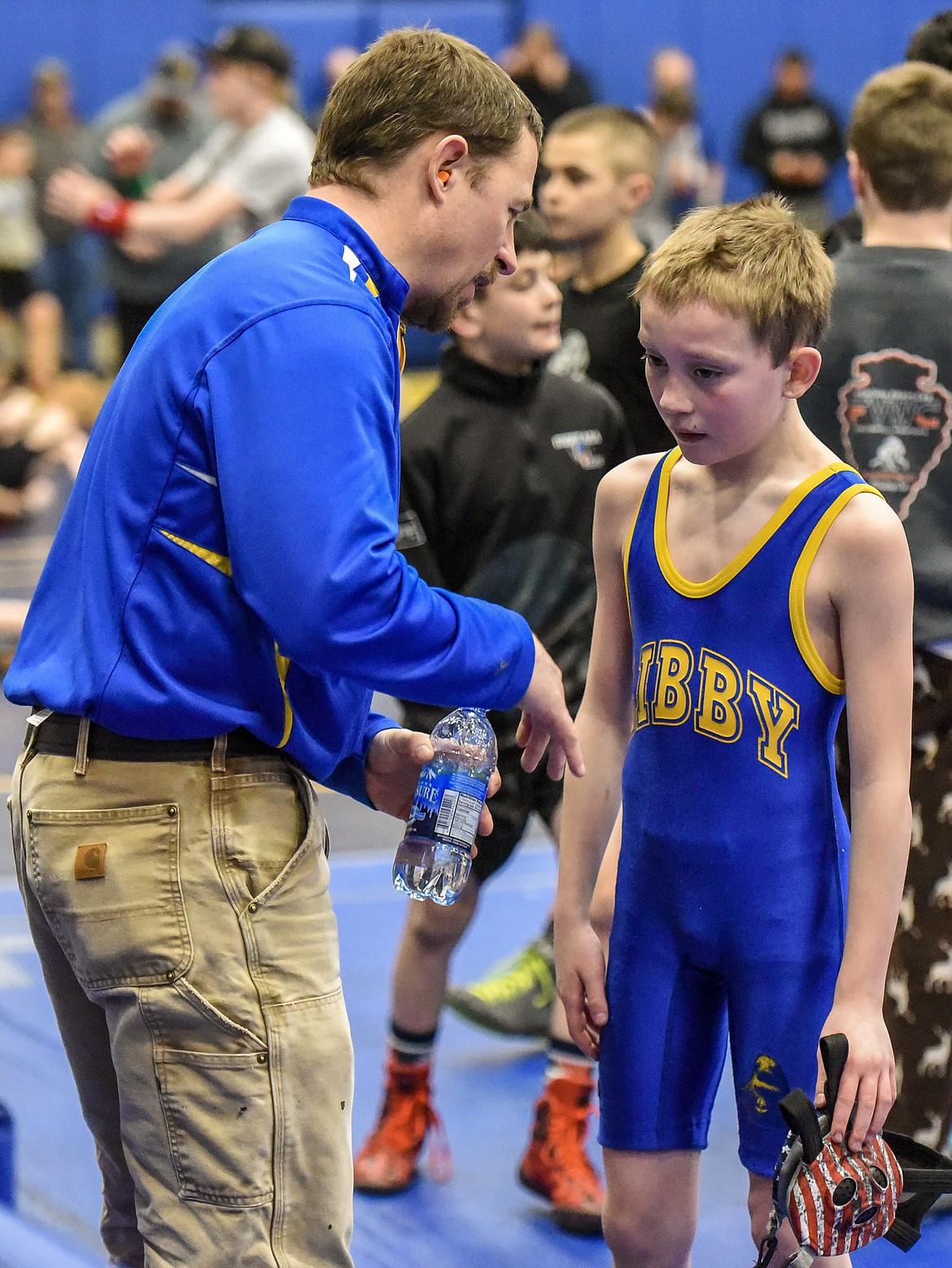 XXXXX XXXXX talks with Noah Leary of Libby after his match at the Kootenai Klassic Wrestling Tournament Saturday. (Ben Kibbey/The Western News)