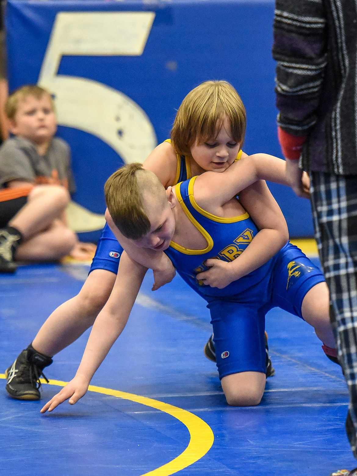 Tristan Tracy of Libby works to get a hold on Isaiah Daggett of Libby at the Kootenai Klassic Wrestling Tournament Saturday. (Ben Kibbey/The Western News)