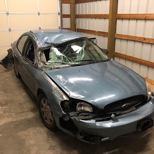 Moses Lake Police Department/courtesy photo
What is left of the car that crashed into a man who was riding a horse on North Frontage Road Friday night.