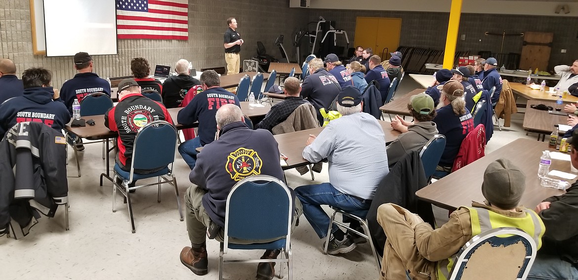 Photo by MANDI BATEMAN
Big Sky Fire Department Battalion Chief Training Officer Seth Barker spoke to firefighters about the risks of cancer on Thursday, February 28.