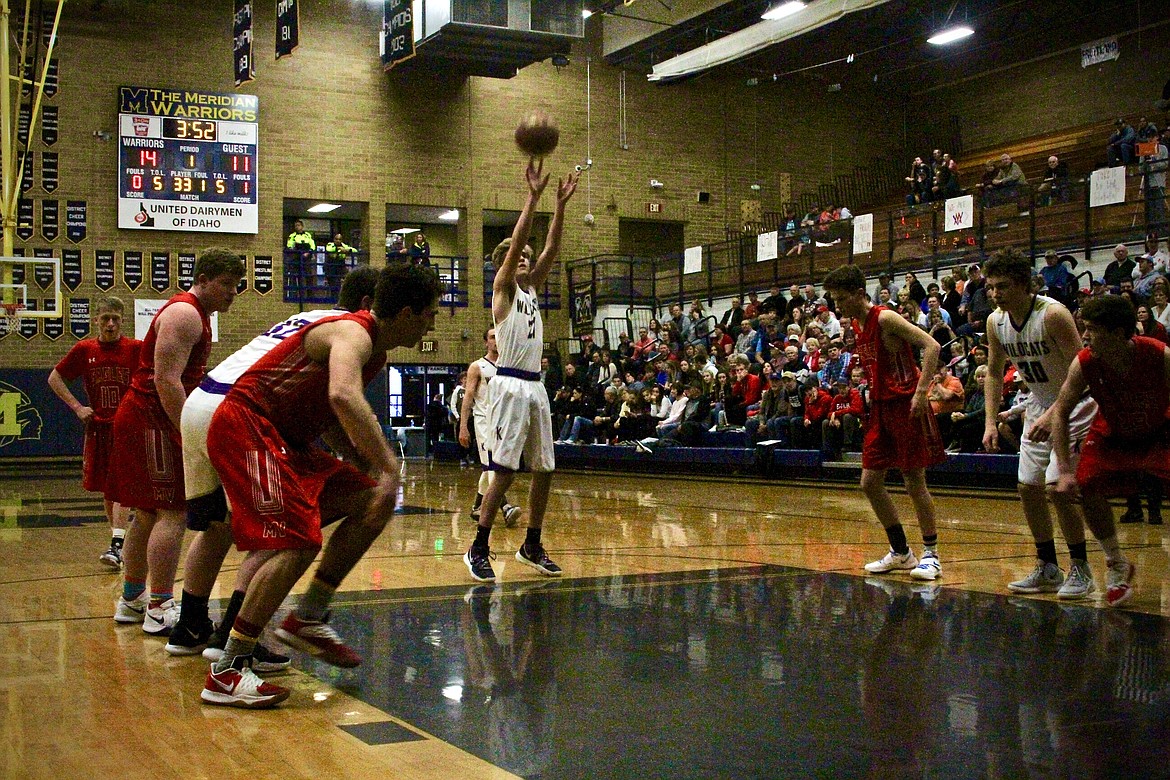 Graden Nearing knocks down a free throw during the Wildcats&#146; loss to Marsh Valley.