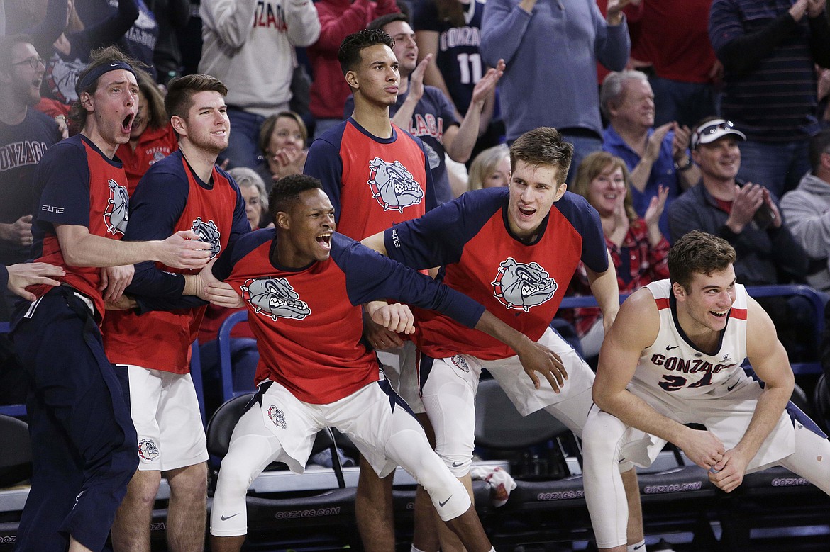 AP file photo/Young Kwak 
Gonzaga hopes to see more bench celebrations like this one, from their Feb. 23 home win over BYU, as the NCAA tournament begins this week.