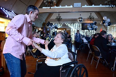 Susan Allison dances with her son David during the Senior's Ball at the Immanuel Skilled Care Center at Immanuel Lutheran Communities in Kalispell on Friday. (Casey Kreider/Daily Inter Lake)