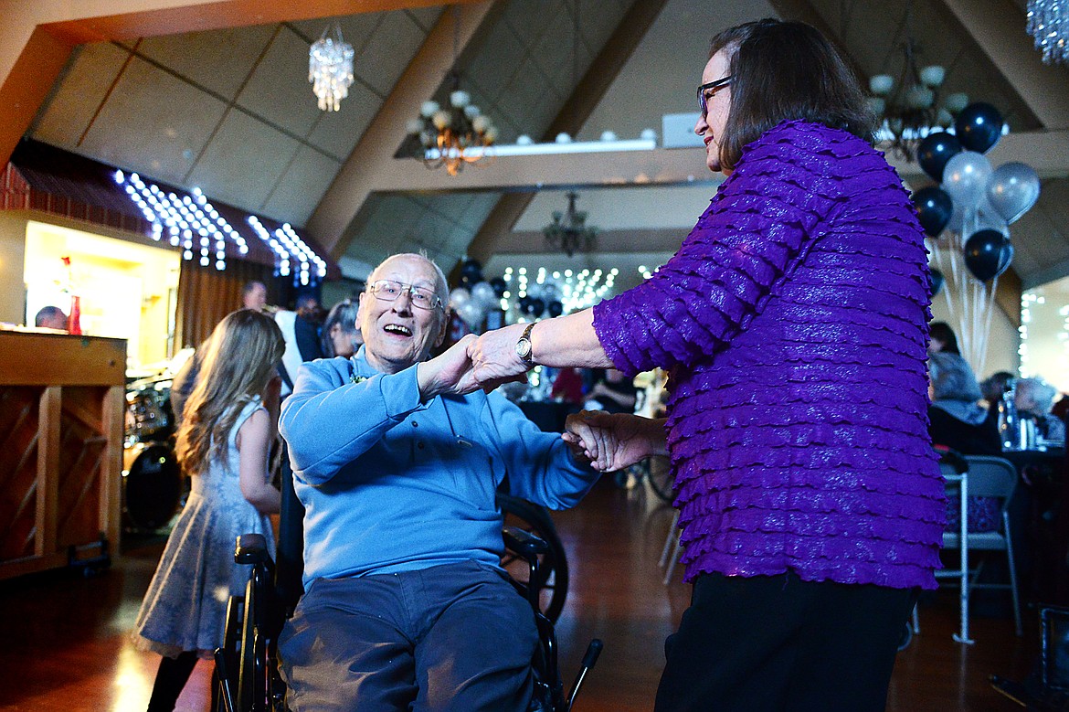 Joop Thiesen dances with Pam Andrews, life enrichment coordinator with Immanuel Lutheran Communities, during the Senior's Ball at the Immanuel Skilled Care Center in Kalispell on Friday. (Casey Kreider/Daily Inter Lake)