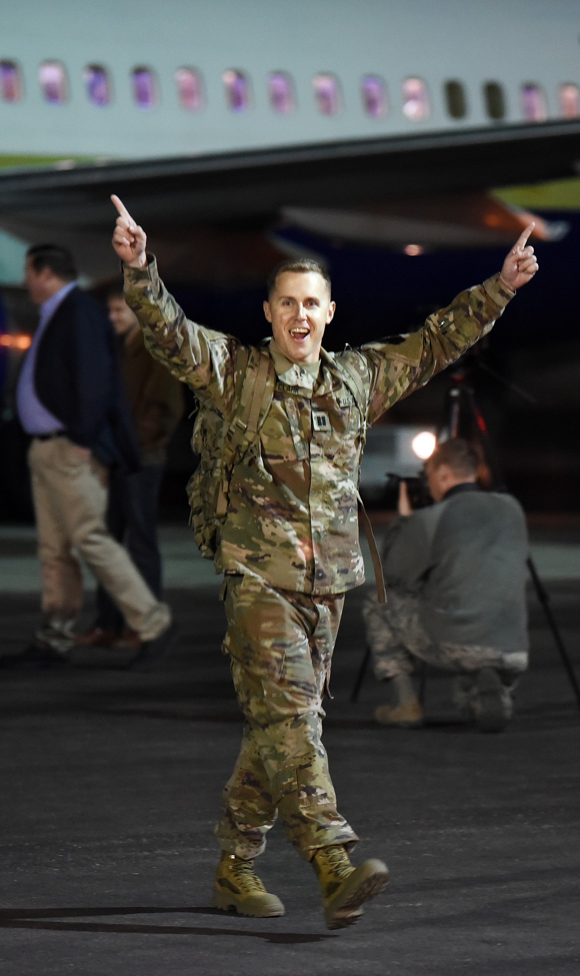 First off the plane was Capt. Chris Clark of the Montana National Guard 495th Combat Sustainment Support Battalion. The 495th is returning from a nine month deployment in Afghanistan. (Brenda Ahearn/Daily Inter Lake)