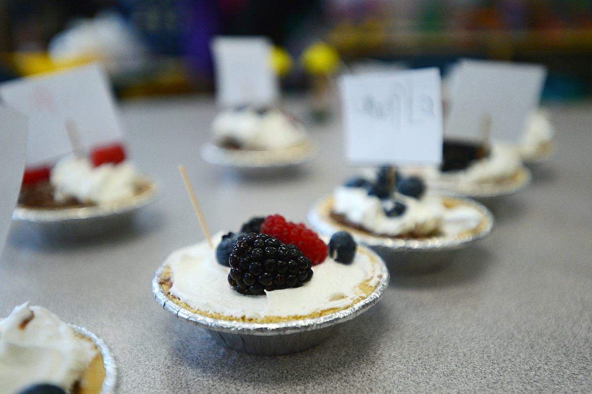 Pies made by attendees are displayed on a table during Pre-K Pi(e) Day at Peterson Elementary on Wednesday. (Casey Kreider/Daily Inter Lake)