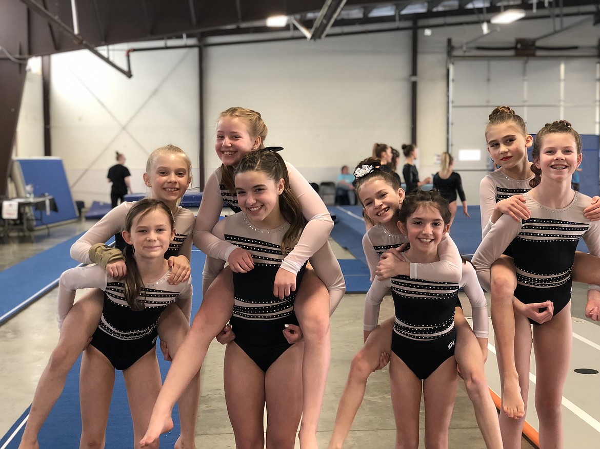 Courtesy photo
Avant Coeur Xcel Silvers at the Snow Globe Classic gymnastics meet held at the Kootenai County Fairgrounds. In the front row from left are Lily Black, Mya Trejos, Karsen Carter and Aiva Reed; and back row from left, Dakota Hoch, Macie Hoffman, Delaney Adlard and River Kermelis.