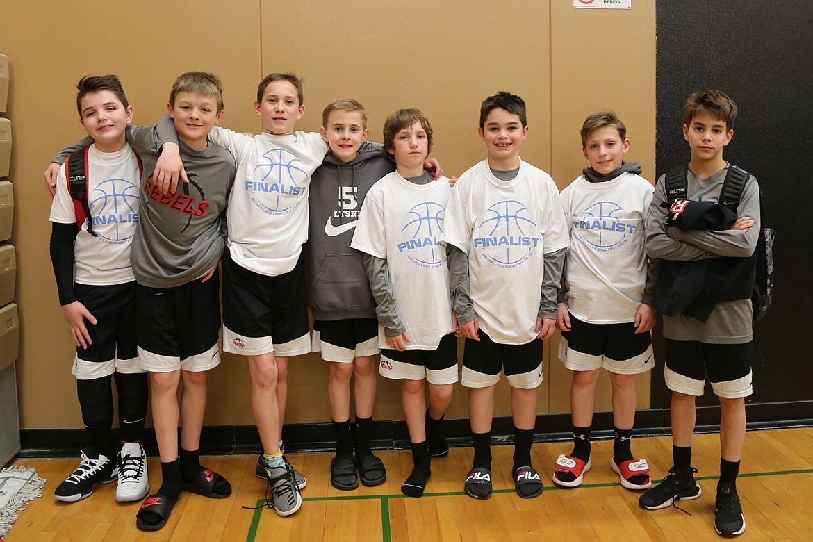 Courtesy photo
The Post Falls Runnin&#146; Rebels fifth-grade boys basketball team finished second in the sixth-grade division of the Moses Lake Shootout. From left are Raymond Brown, Connor Carver, Jace Ostlund, Jaxon Lysne, Elliot Ries, Cashton Bodman, Braxxton Barker and Isaiah Naylor.