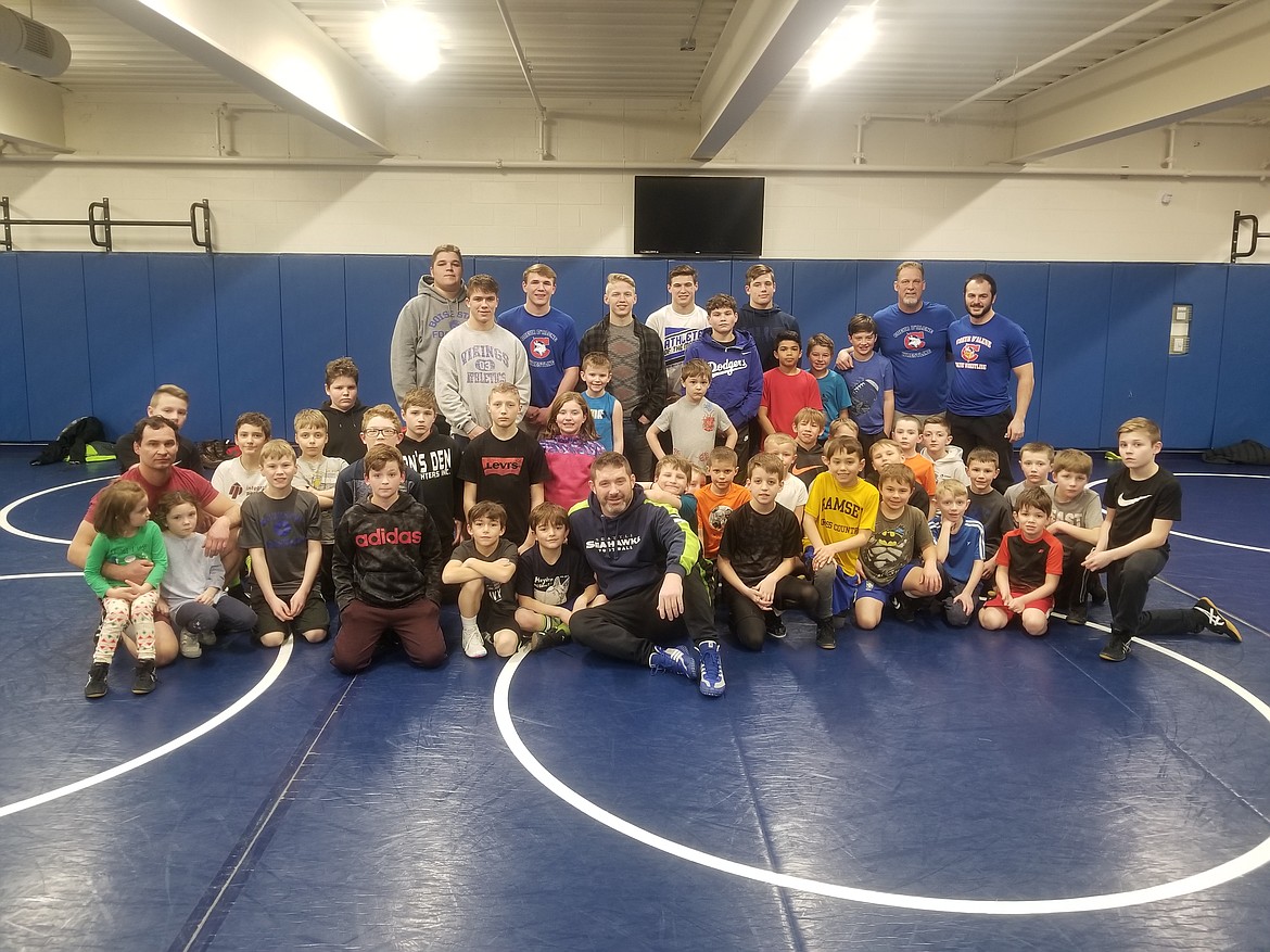 Courtesy photo
Coeur d'Alene High School wrestling team members recently posted for a photo with the Buzzsaw club wrestling team. Coeur d'Alene finished second at last month's state 5A tournament in Pocatello, and all of the Vikings's state placers were former Buzzsaw wrestlers.