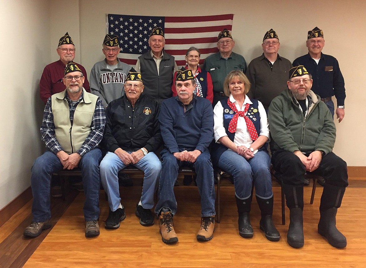 Among the American Legion Post 137 active members are, left to right, front row: Ron Boespflug, adjutant; Lee Heser, finance chair; Ray Anderson, Auxiliary President Darlene Johnson and Bob Lehman; back row: Ed Van Scoten, Commander Jim Miller, Ron Bauer, historian; Ann MacCary, Auxiliary; Leo Schaefer, chaplain; Mike O&#146;Neil, building manager; and Bob Bigler, white marker chairman. (Photo courtesy Post 137)