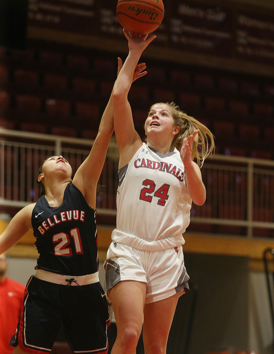 North Idaho College guard Alex Carlton goes for the layup against Bellevue&#146;s Ashley Anderson in a game on Dec. 18.