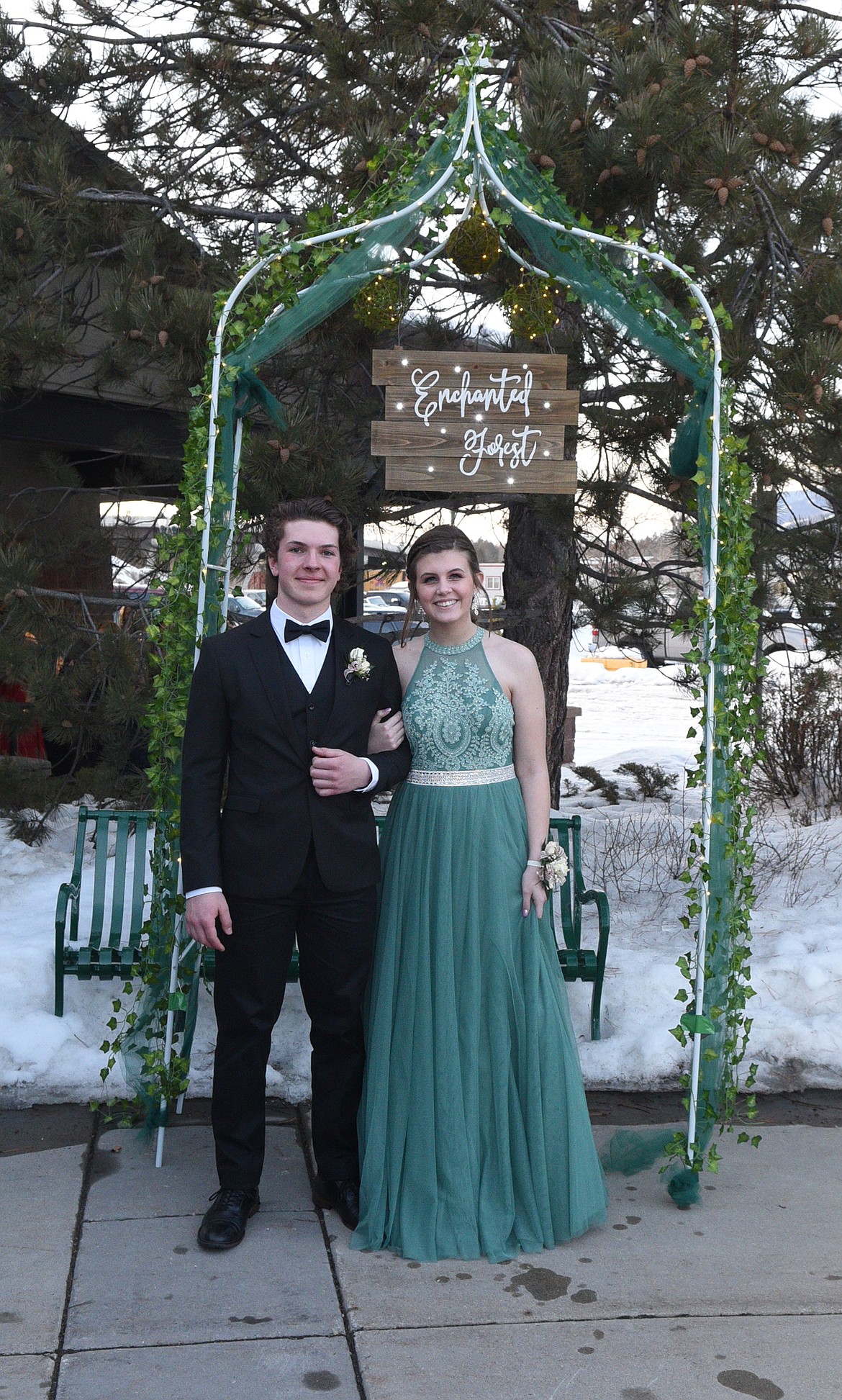 Students walk in the Grand March Saturday night during the Whitefish High School Prom at the O&#146;Shaughnessy Center. (Heidi Desch/Whitefish Pilot)