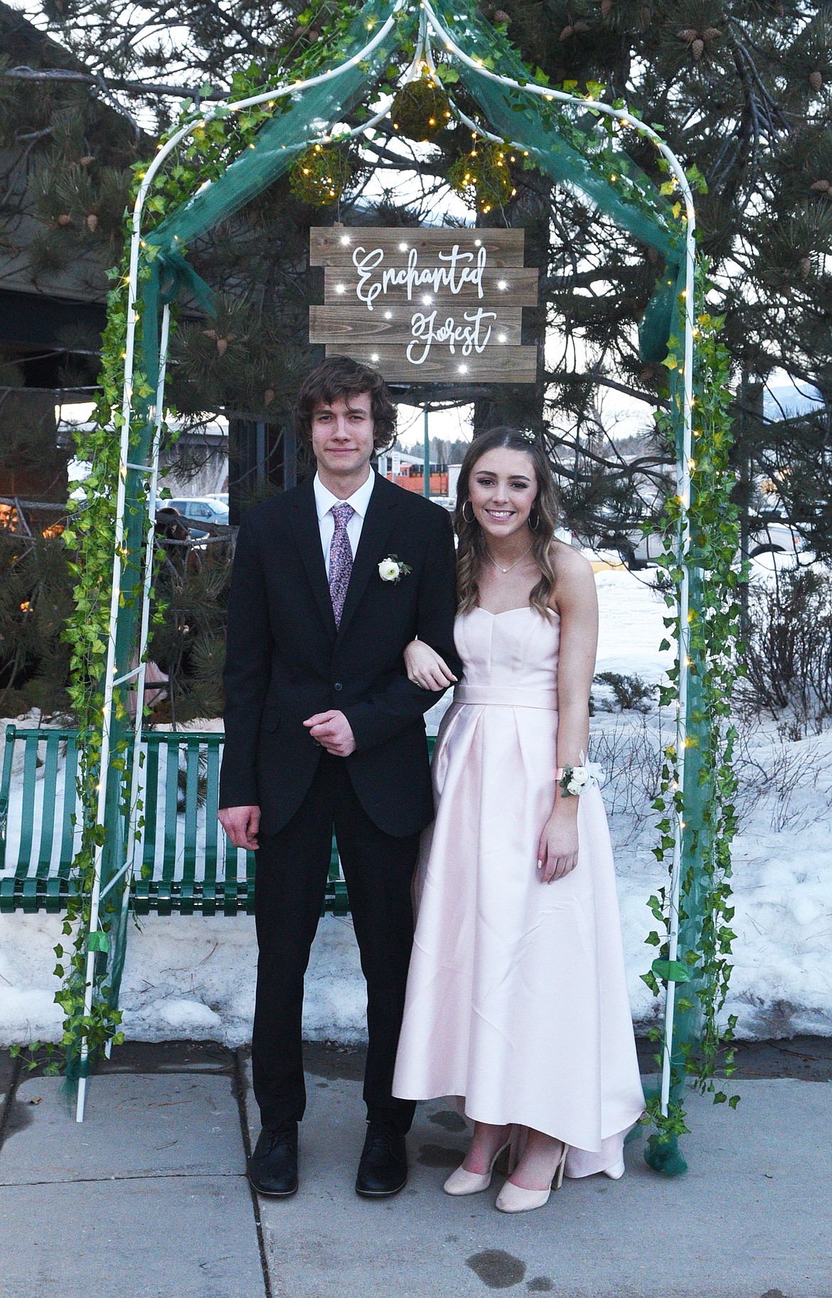 Students walk in the Grand March Saturday night during the Whitefish High School Prom at the O&#146;Shaughnessy Center. (Heidi Desch/Whitefish Pilot)