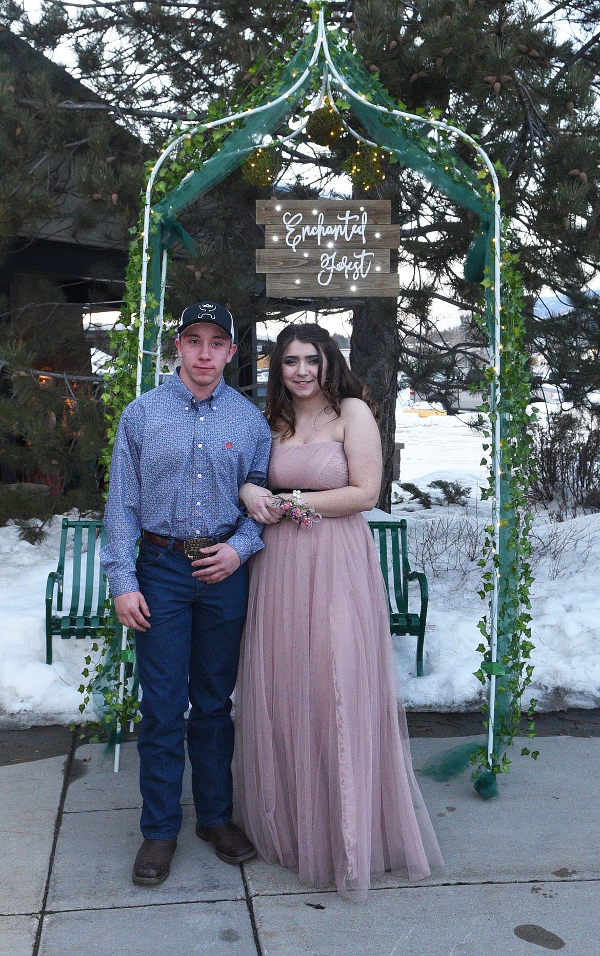 Students walk in the Grand March Saturday night during the Whitefish High School Prom at the O&#146;Shaughnessy Center. (Heidi Desch/Whitefish Pilot)