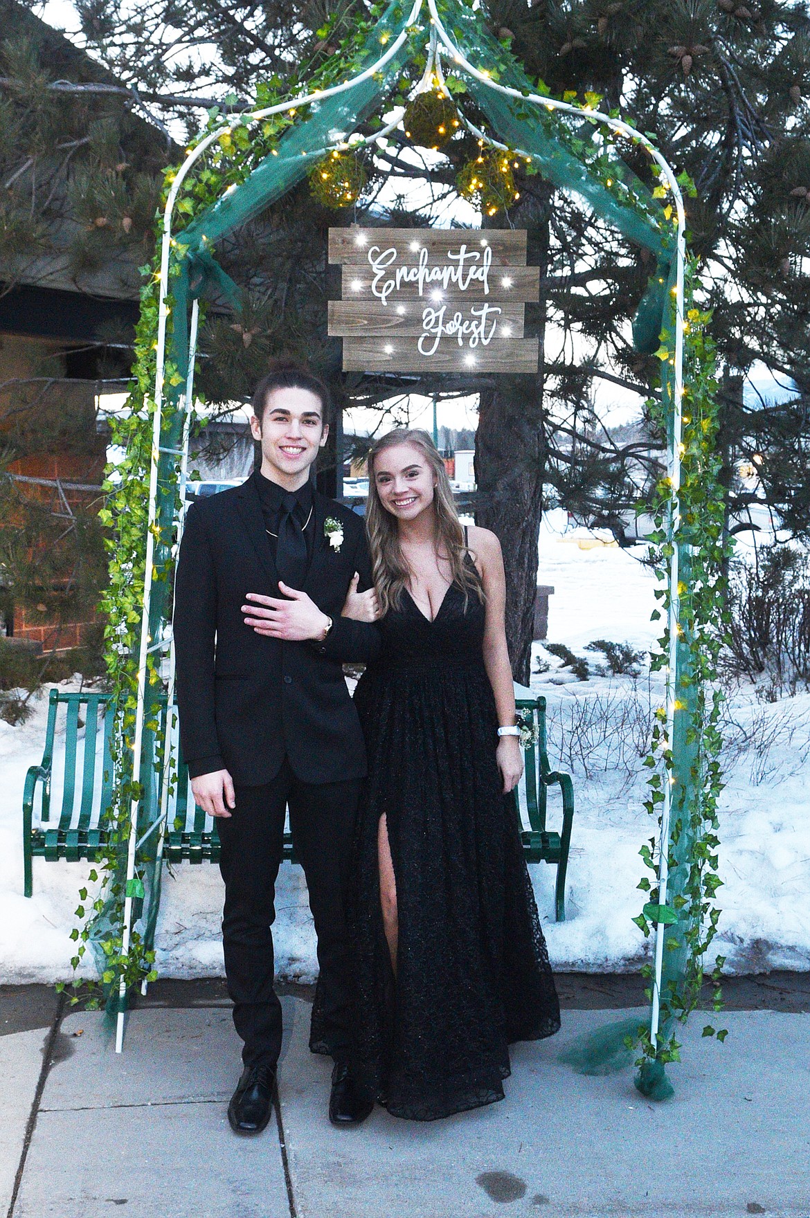 Students walk in the Grand March Saturday night during the Whitefish High School Prom at the O&#146;Shaughnessy Center. (Heidi Desch/Whitefish Pilot)