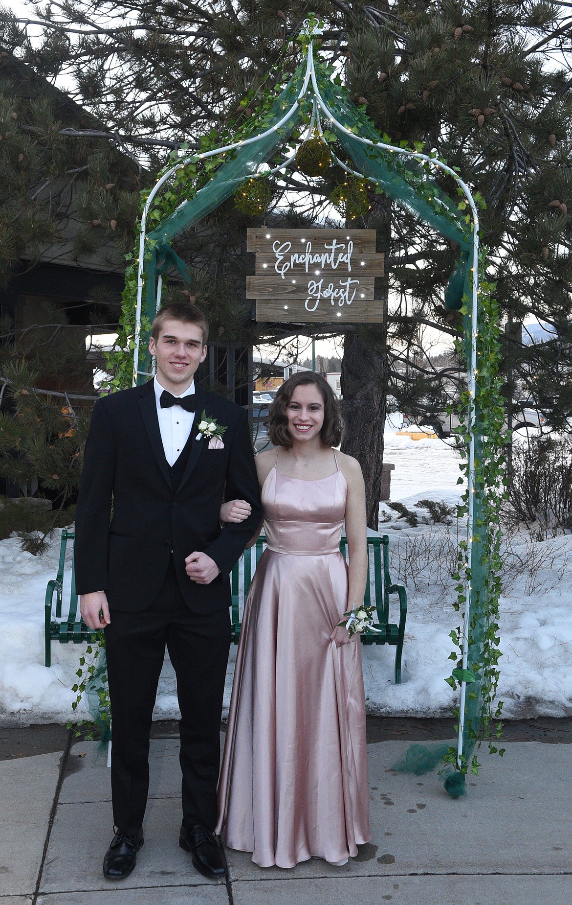 Students walk in the Grand March Saturday night during the Whitefish High School Prom at the O&#146;Shaughnessy Center. (Heidi Desch/Whitefish Pilot)