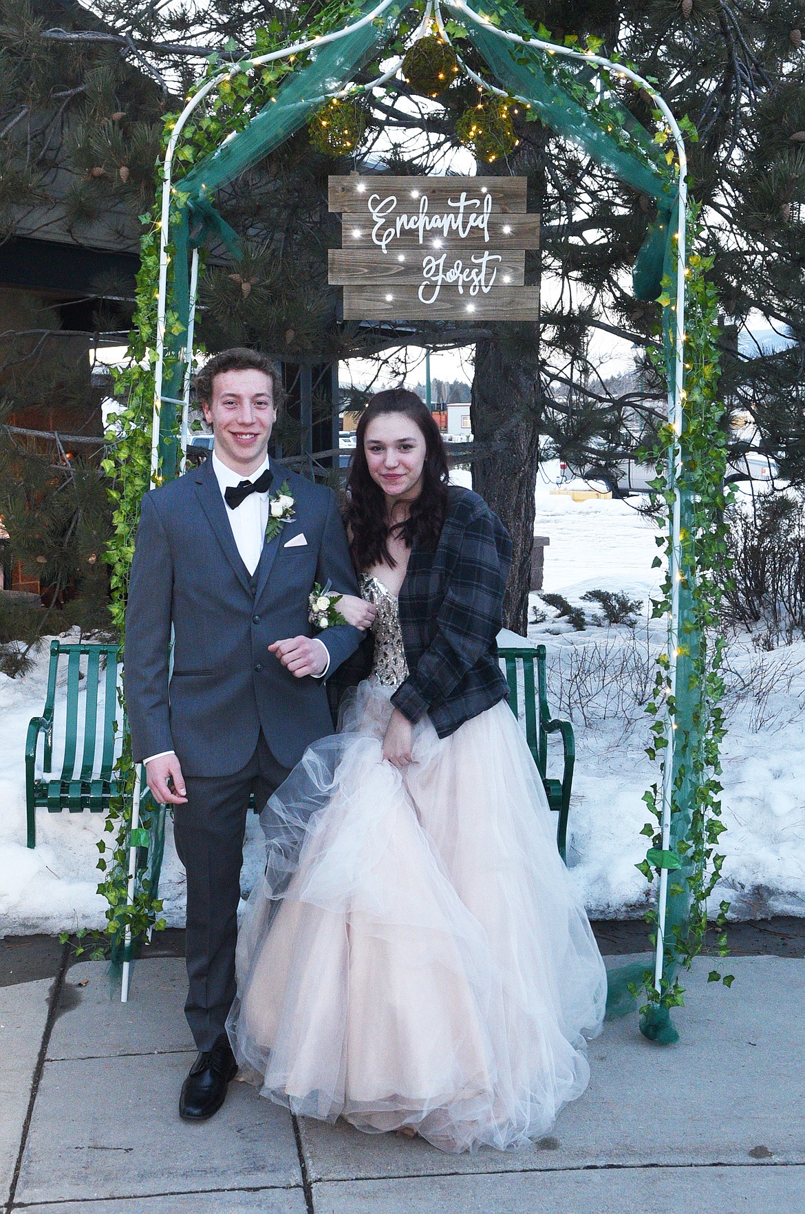 Students walk in the Grand March Saturday night during the Whitefish High School Prom at the O&#146;Shaughnessy Center. (Heidi Desch/Whitefish Pilot)