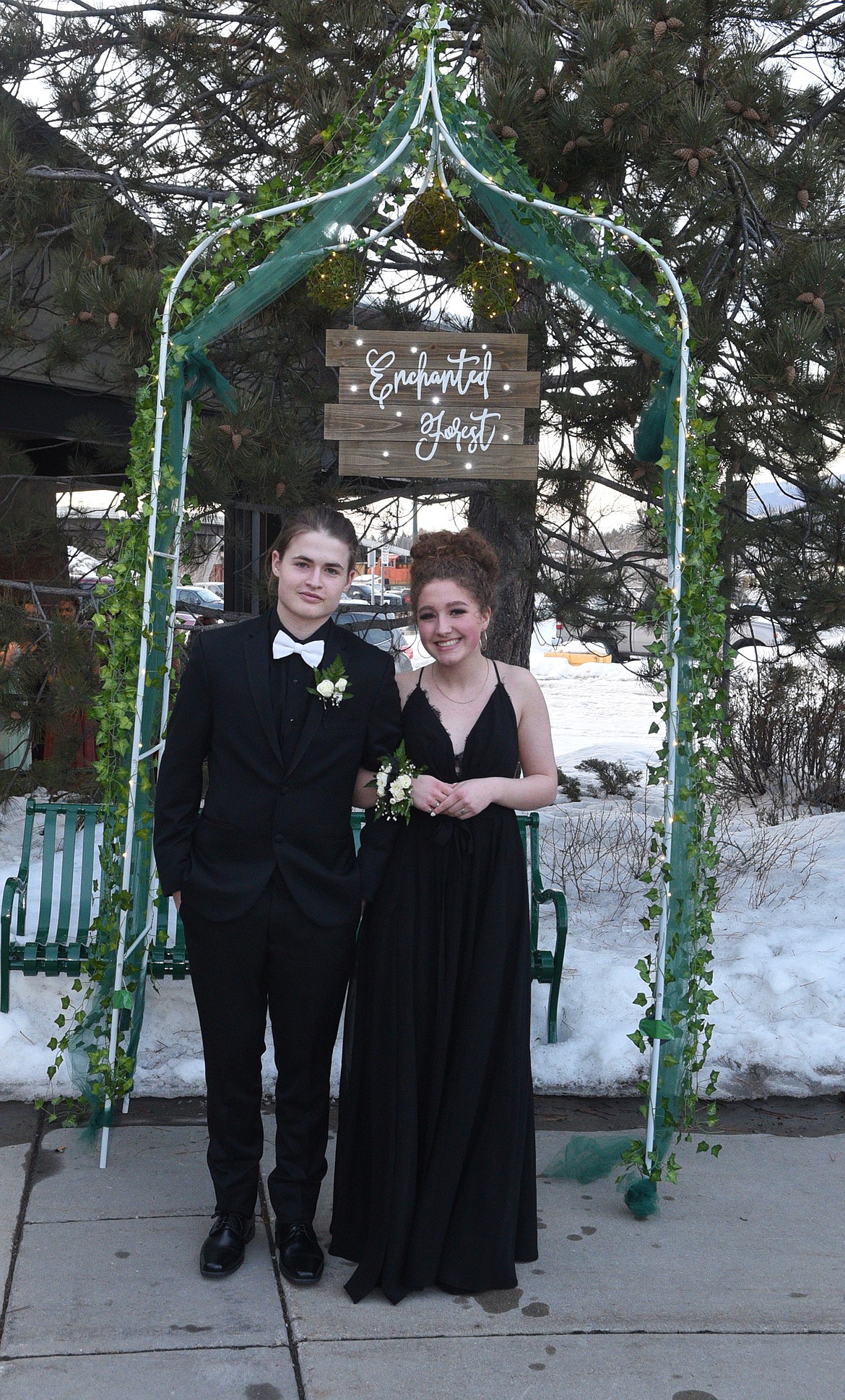 Students walk in the Grand March Saturday night during the Whitefish High School Prom at the O&#146;Shaughnessy Center. (Heidi Desch/Whitefish Pilot)