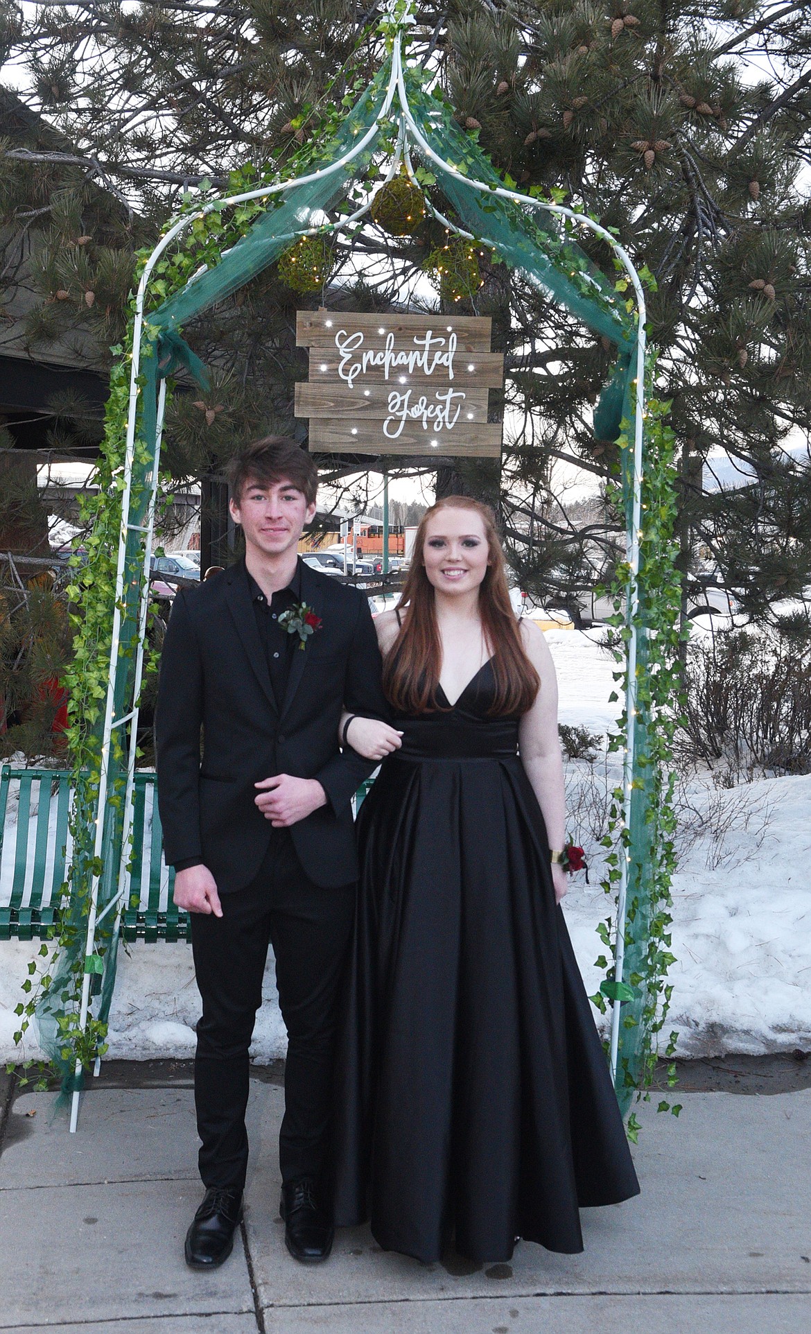 Students walk in the Grand March Saturday night during the Whitefish High School Prom at the O&#146;Shaughnessy Center. (Heidi Desch/Whitefish Pilot)