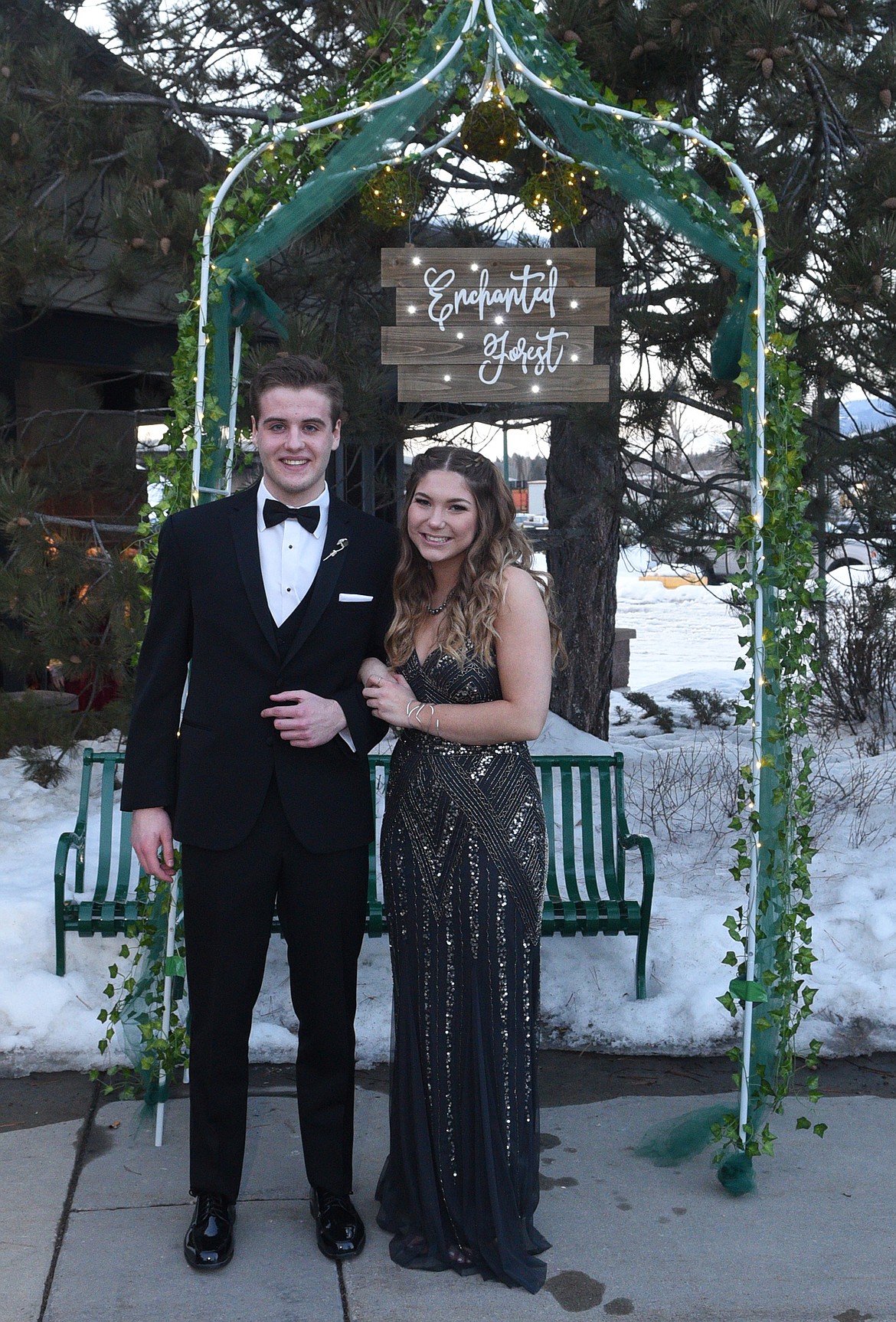 Students walk in the Grand March Saturday night during the Whitefish High School Prom at the O&#146;Shaughnessy Center. (Heidi Desch/Whitefish Pilot)