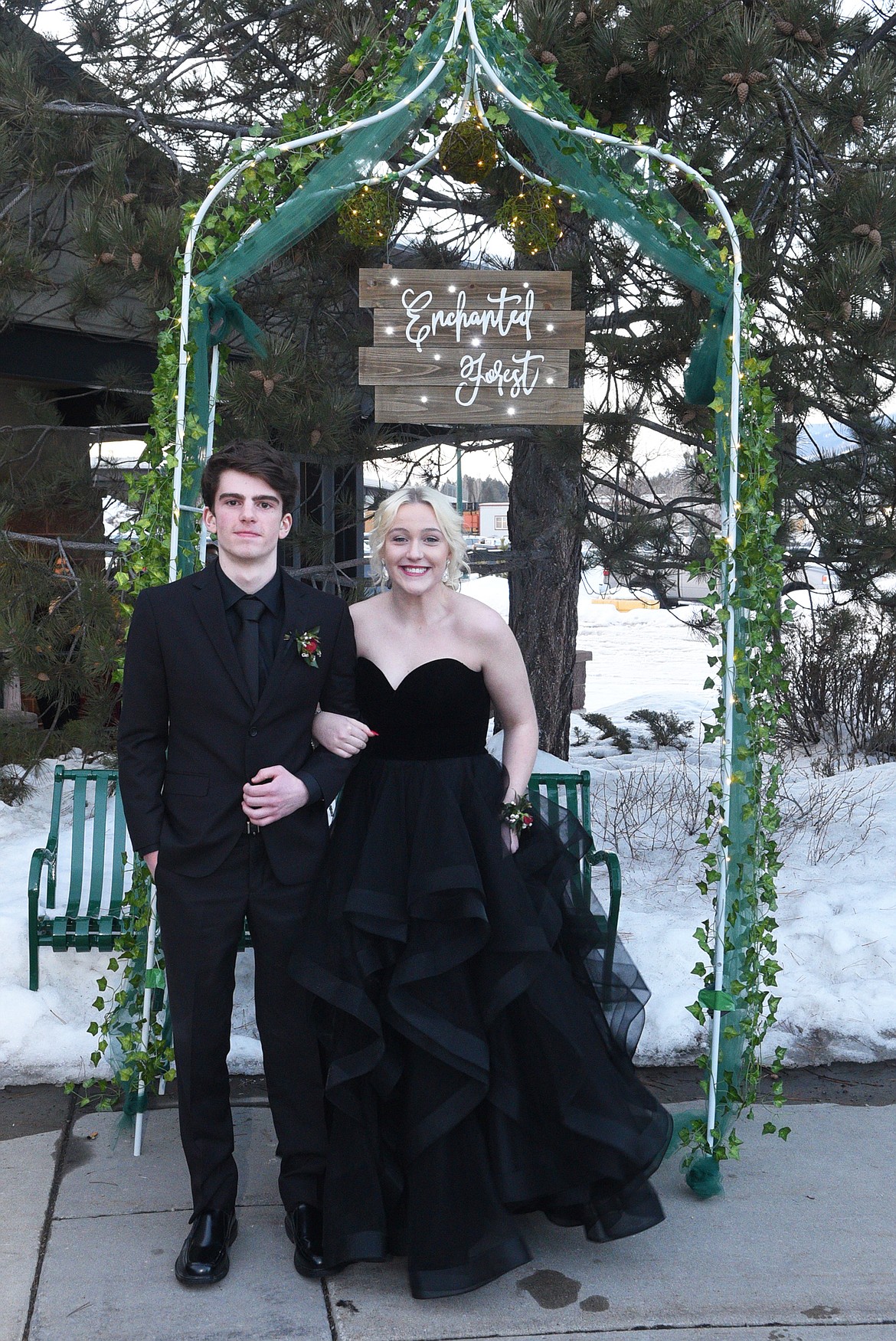 Students walk in the Grand March Saturday night during the Whitefish High School Prom at the O&#146;Shaughnessy Center. (Heidi Desch/Whitefish Pilot)