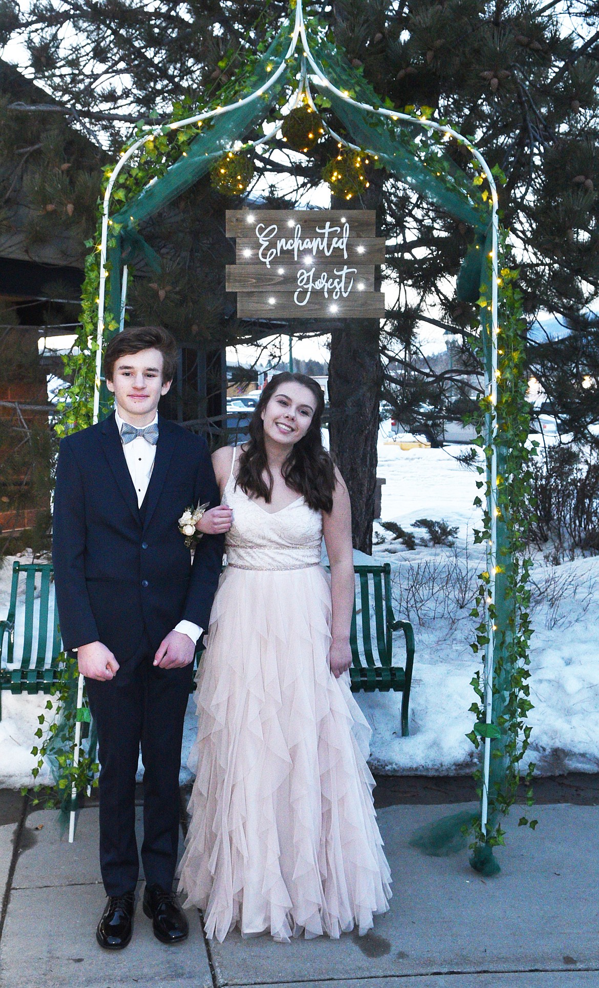 Students walk in the Grand March Saturday night during the Whitefish High School Prom at the O&#146;Shaughnessy Center. (Heidi Desch/Whitefish Pilot)