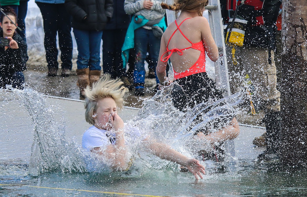 Photo by MANDI BATEMAN
A duo takes the plunge to benefit Special Olympics.