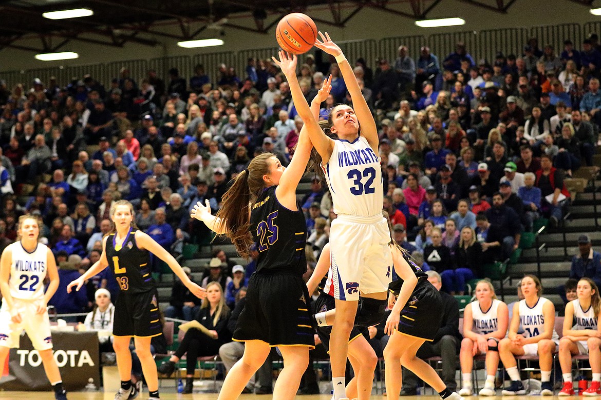 Madysen Hoerner goes up for a shot against Laurel in the Class A consolation game Saturday. The Kats downed the Locomotives to earn the third-place trophy. (Bob Windauer photo)