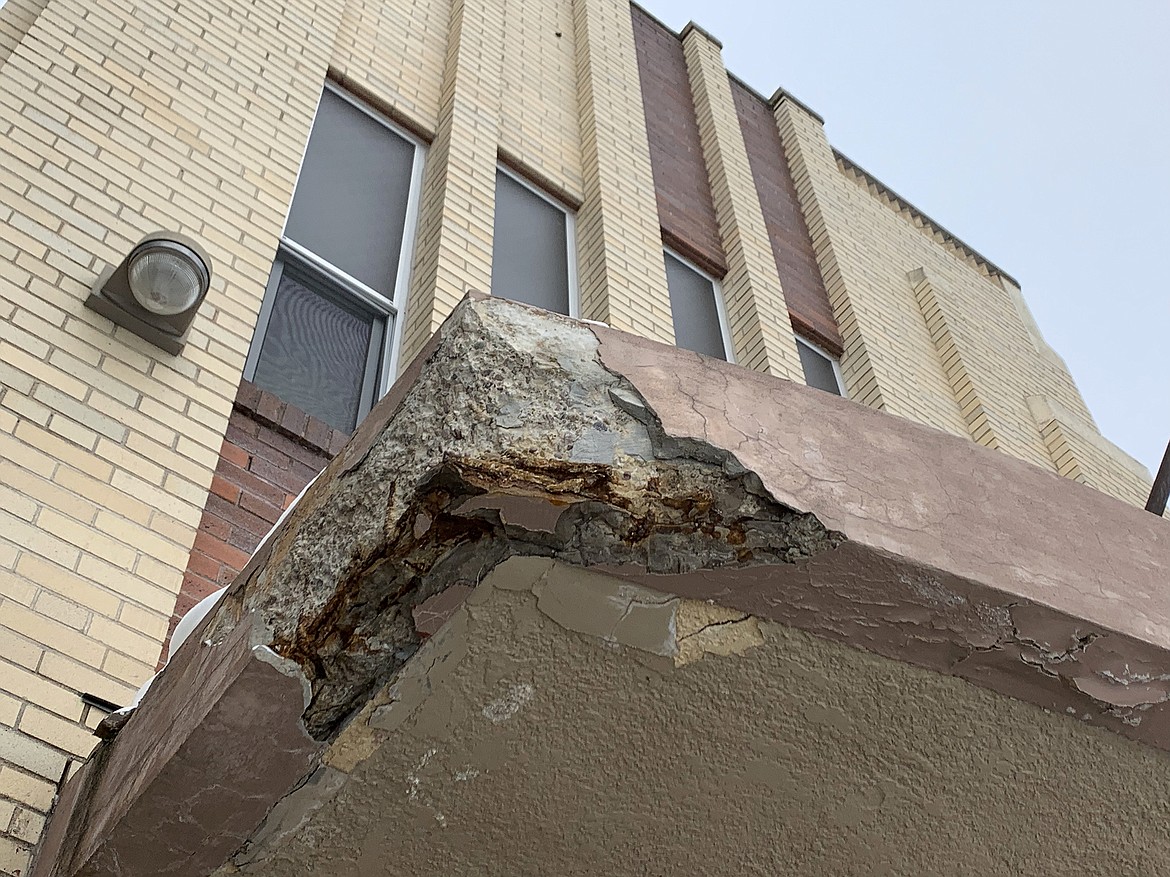 The awning over the entry to the oldest section of Glacier Gateway has crumbled to the rebar and is continuing to deteriorate. (Jeremy Weber photo)