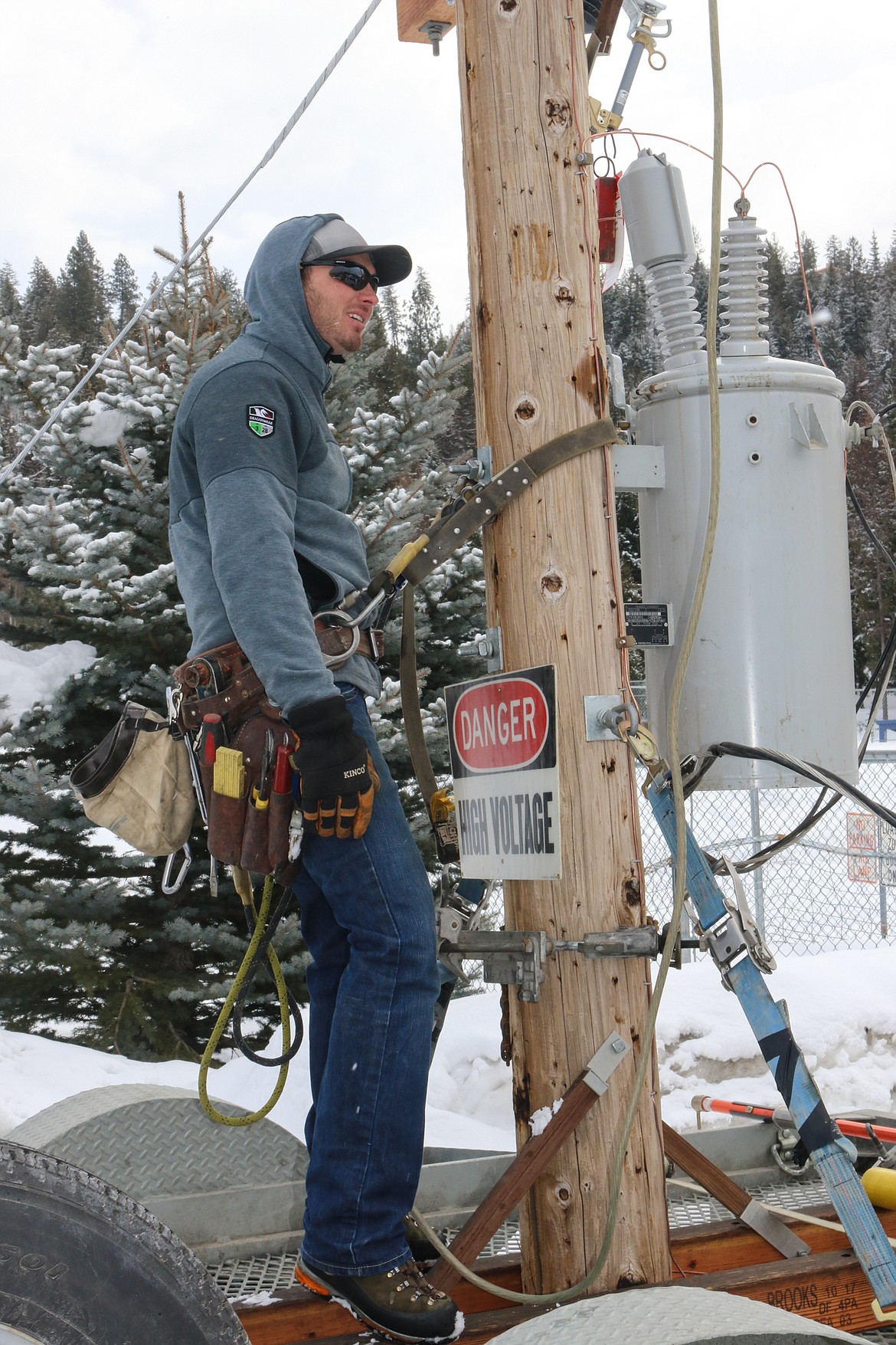 Photo by MANDI BATEMAN
Northern Lights lineman demonstrates what the students would be doing it they chose lineman as a career.