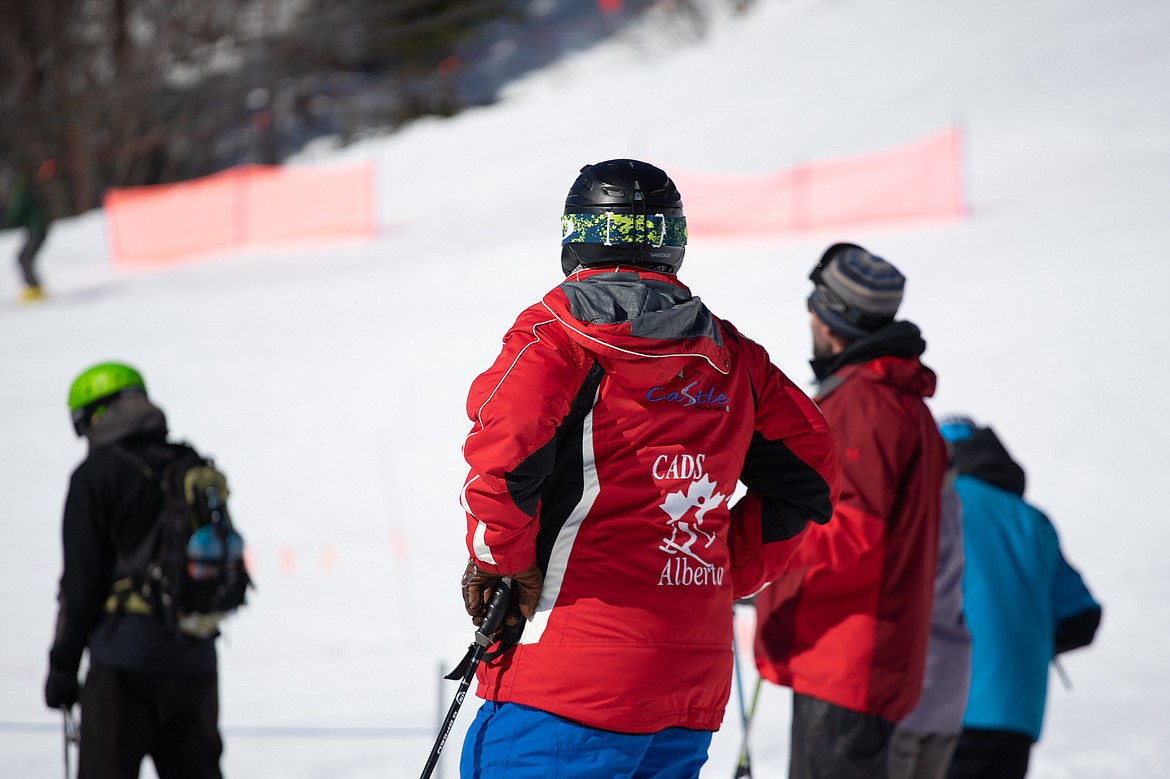 Skiers relax before heading back up Chair 1 on Sunday at Whitefish Mountain Resort. (Daniel McKay/Whitefish Pilot)