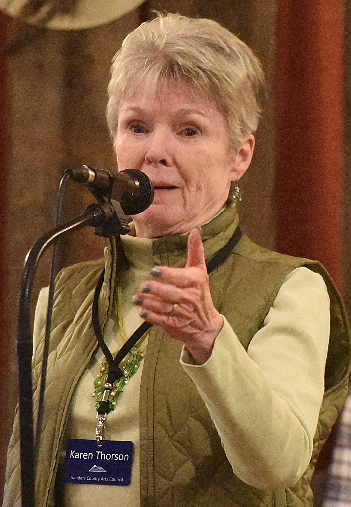 SANDERS COUNTY Arts Council board member Karen Thorson speaks to the crowd to conclude Tapestry, the arts council's performing arts season event.