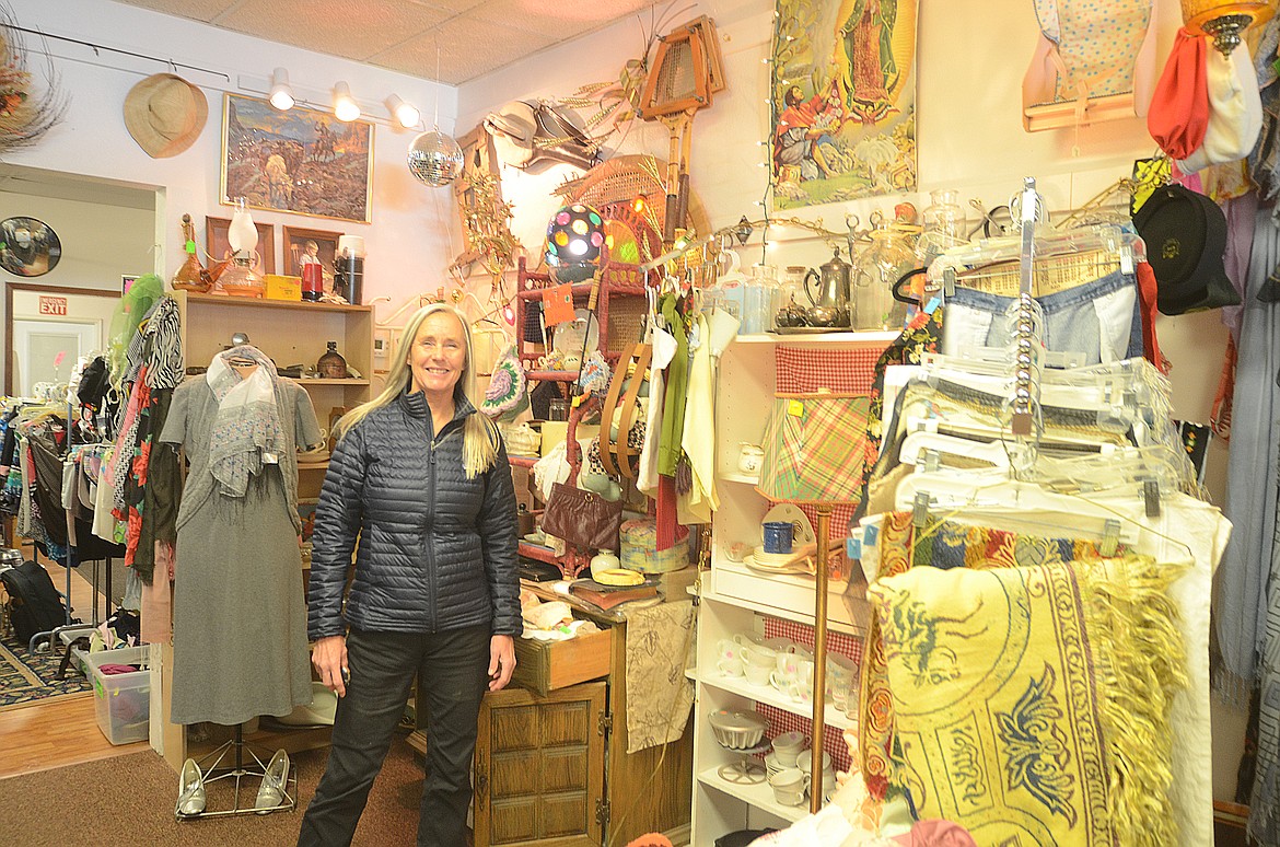 FOLKSHOP MANAGER manager Barbara Rentschler in her favorite corner, the &#147;Vintage&#148; section. She and her staff not only manage a self-sustaining non-profit business, but donate significantly to other non-profits throughout the area. (Carolyn Hidy photos/Lake County Leader)