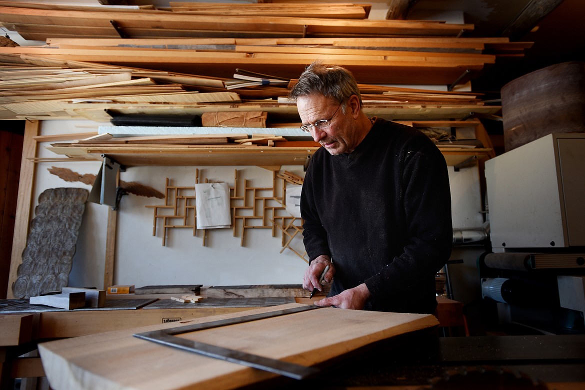 David Secrest working in his home studio in Somers on Thursday, February 21.(Brenda Ahearn/Daily Inter Lake)