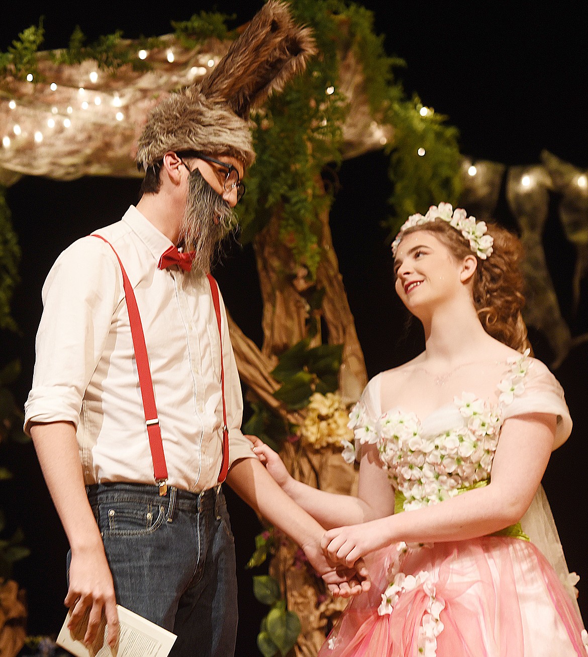 BOTTOM, WHO is played by Joe McDonald, tries not to act like the jackass he was transformed into while speaking to Titania, portrayed by Meghan Speckert.