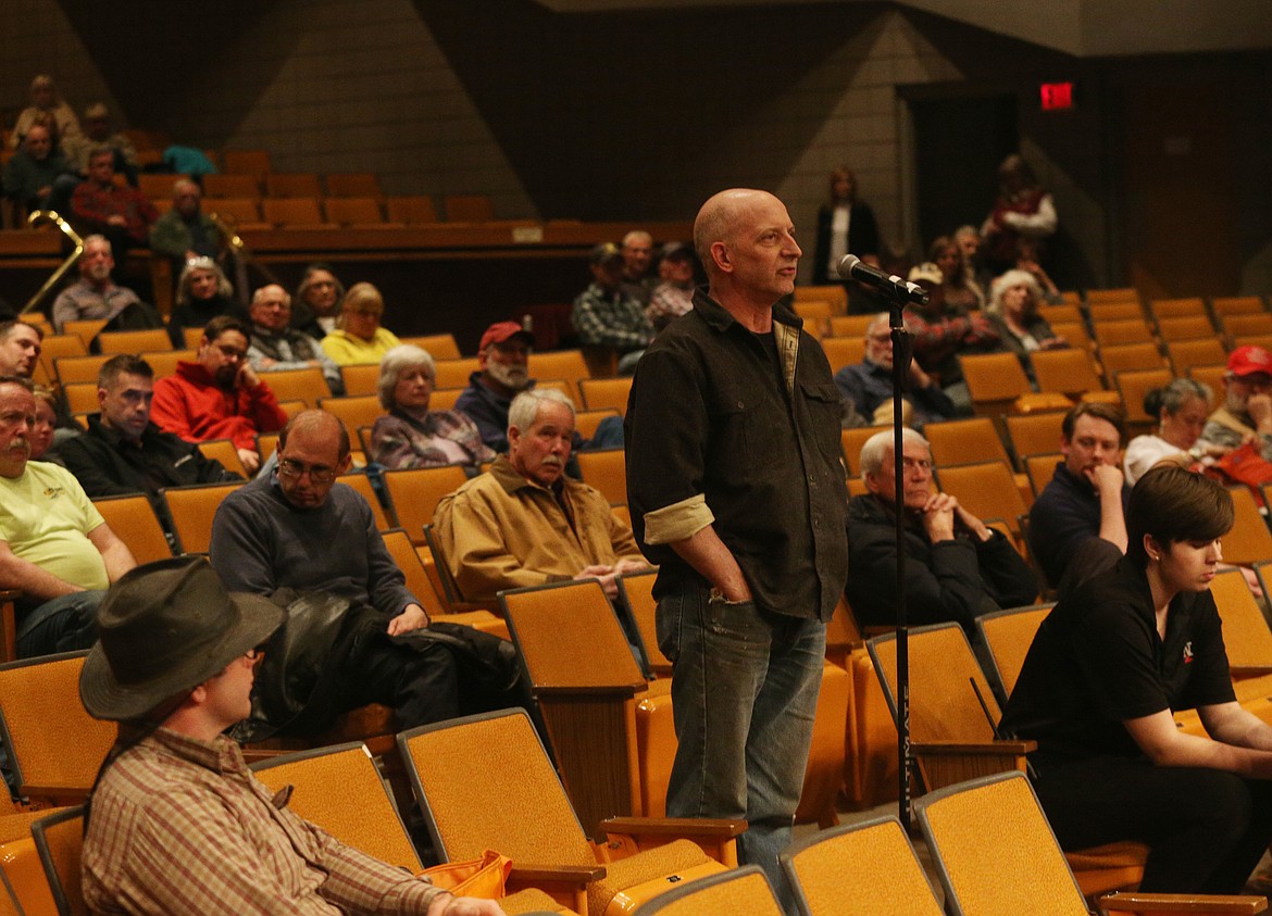 Chris Holbert gives his personal testimony during a public hearing on the Kootenai County building permit process Thursday night at the Schuler Performing Arts Center at NIC. (LOREN BENOIT/Press)