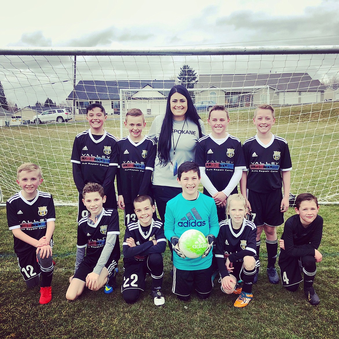 Courtesy photo
North Idaho&#146;s FC Spokane Rider White boys 08 soccer team opened its spring season with a 3-0 win over Hells Canyon FC in Lewiston on Sunday. In the front row from left are Brian Silbaugh, Kyler Blanchard, Braden Smith, Brady Navarrete, Killian Schreiber and Reid Thompson; and back row from left, Ethan Applegate, Henry Earnest, coach/director of coaching Ashley Rider, Paxton Grant and Collin Brunn.