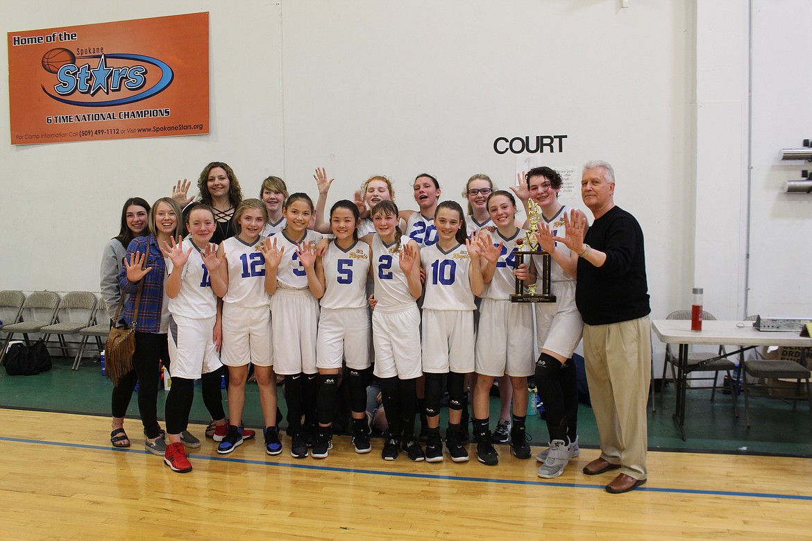 Courtesy photo
North Idaho Christian School won its fifth straight junior high girls basketball championship on Saturday. NICS went 12-0 this year, and its record for the last five years is 81-1. NICS beat Covenant Christian School 40-24 for the championship. In the front row from left are Hailey LePard, manager; Kylee Andrews, assistant coach; Olivia White, Maddie Cooper, Chelsey Cate, Pearl Covey, Danica Kelly, Jennifer Peterson and Allie Whiteman; and back row from left, Mary Schlader, assistant coach; Heidi Williams, Lynsey Overturf, Symone Pilgrim, Kimmie Williams, Rylee Overturf and coach Jerry Bittner.