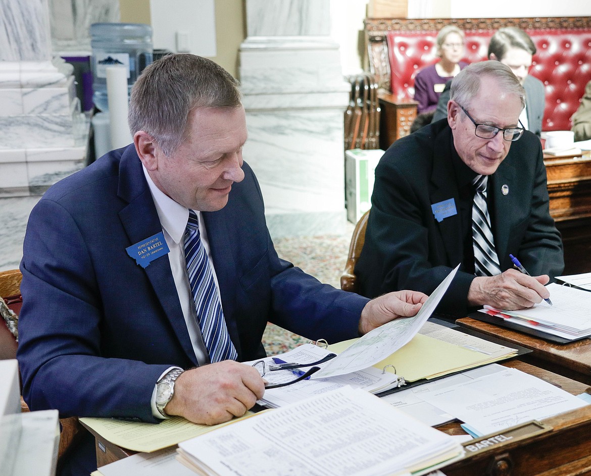 Rep. Dan Bartel (left), R-Lewistown, and Rep. Kenneth Holmlund, R-Miles City, are working on legislation together to address the possibility of bison moving into central Montana. (Shaylee Ragar / UM Legislative News Service)