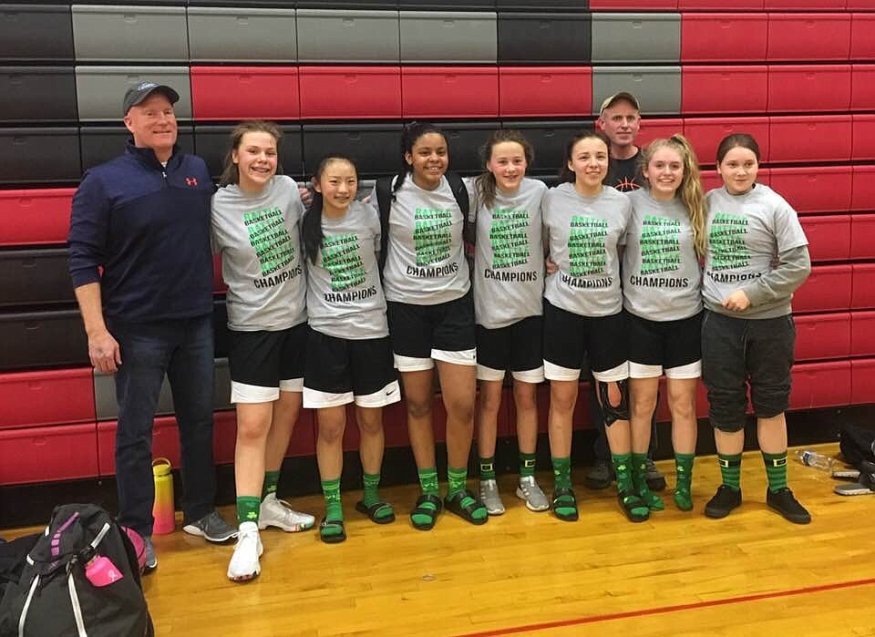 Courtesy photo
The Post Falls Elite seventh-grade girls basketball team won the championship of the 7th/8th grade division at the Battle Basketball tournament in Lewiston. From left are coach Keith Nelson, Kamryn Currie, Lilly Nelson, Kaliah Frazey, Katie Berg, Medawinn GreenSky, coach Mike Gardiner, Joely Gardiner and Sienna Fortune.